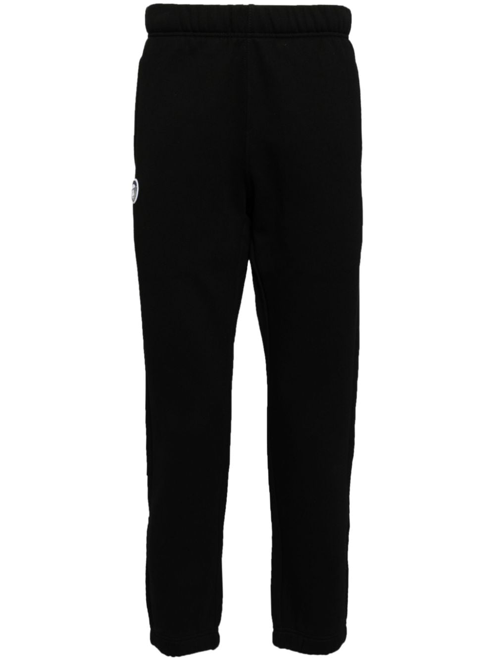 AAPE BY *A BATHING APE® Monofase logo track pants - Black von AAPE BY *A BATHING APE®