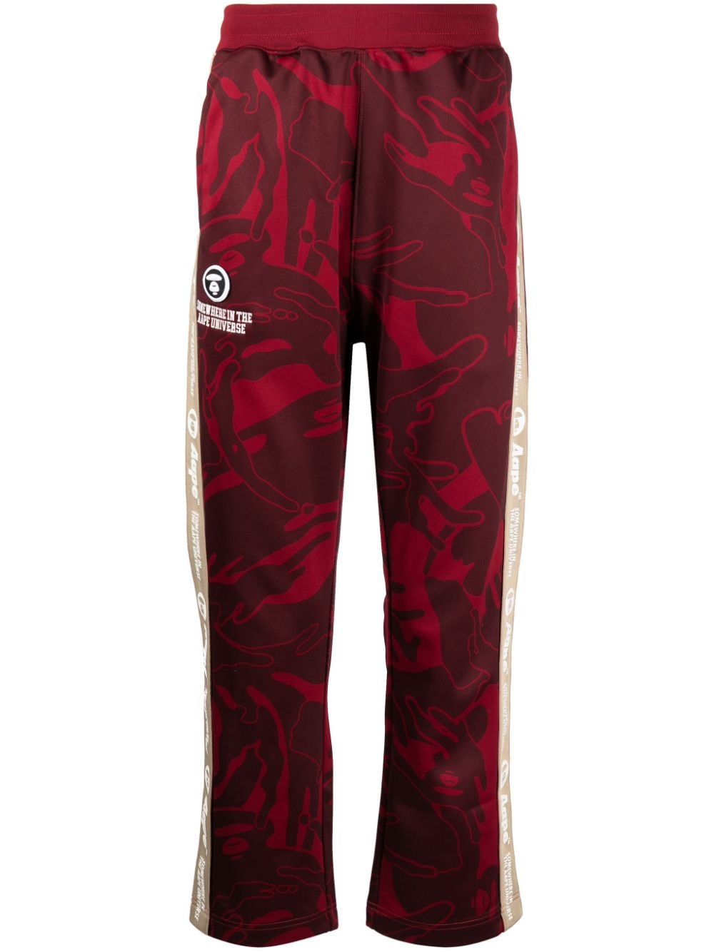 AAPE BY *A BATHING APE® graphic-print logo-patch trousers - Red von AAPE BY *A BATHING APE®