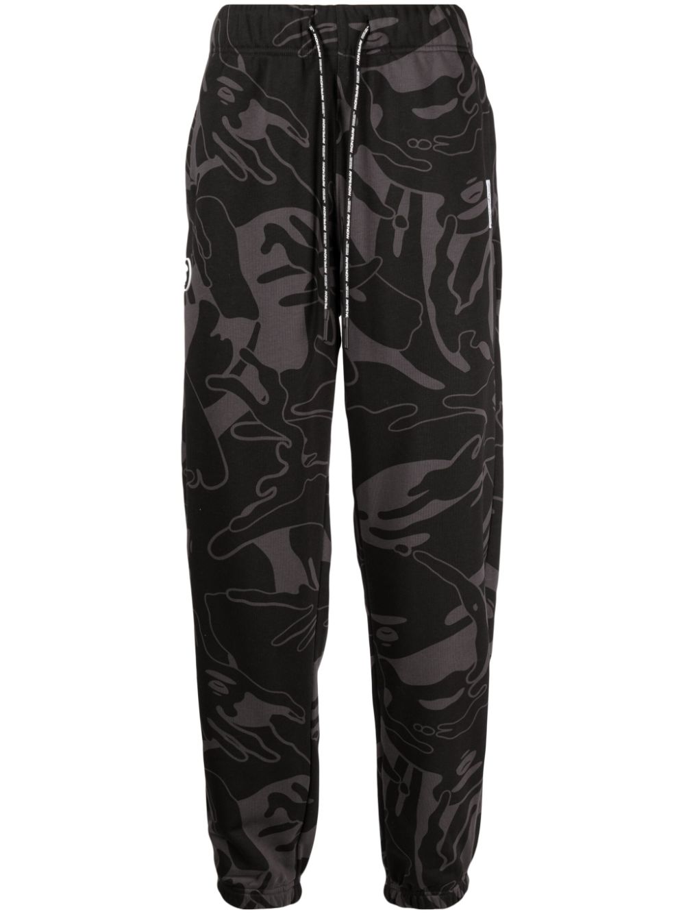 AAPE BY *A BATHING APE® graphic-print tapered trousers - Black von AAPE BY *A BATHING APE®