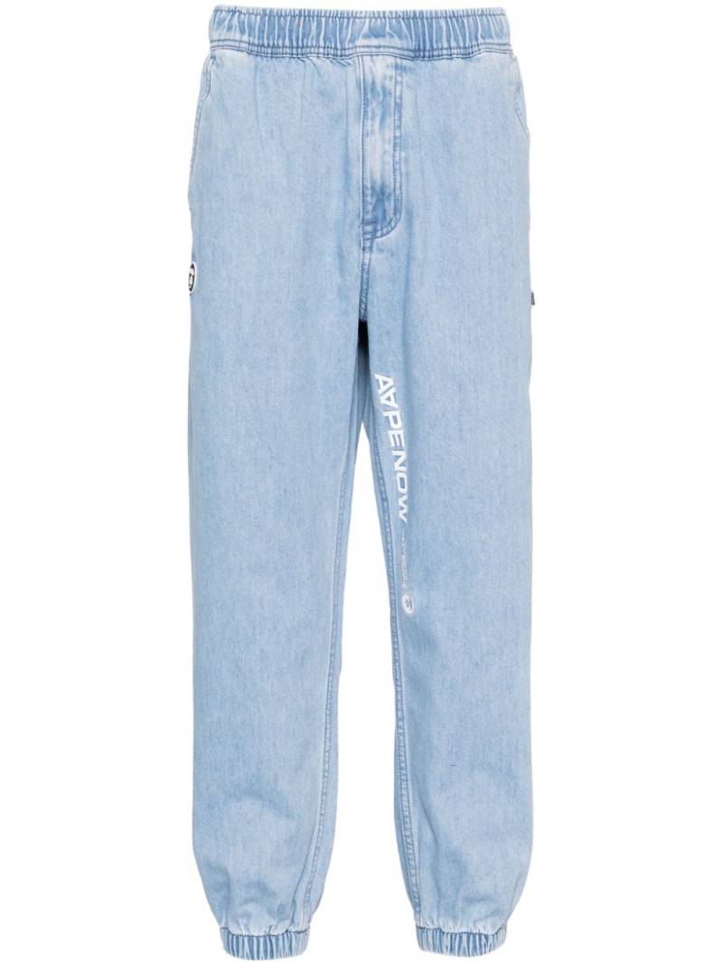 AAPE BY *A BATHING APE® tapered-leg jeans - Blue von AAPE BY *A BATHING APE®