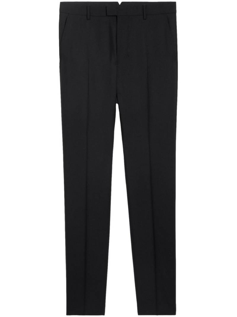 AMI Paris twill tapered-leg trousers - Black von AMI Paris