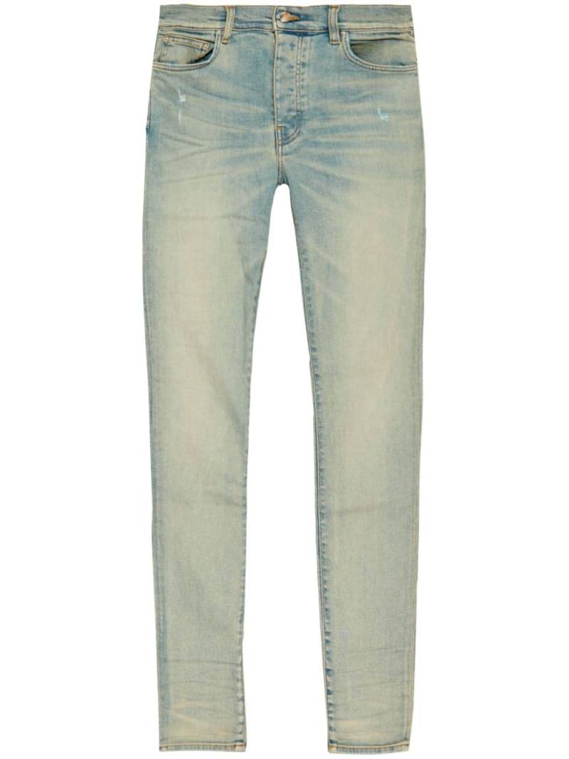 AMIRI Stack low-rise skinny jeans - Blue von AMIRI