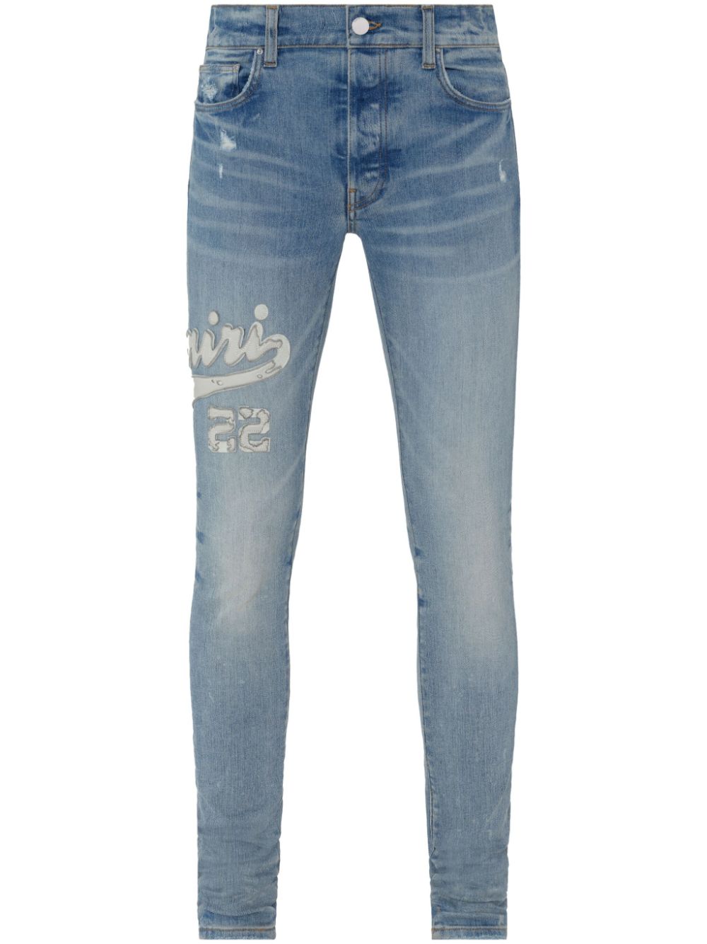 AMIRI Varsity logo appliqué skinny jeans - Blue von AMIRI