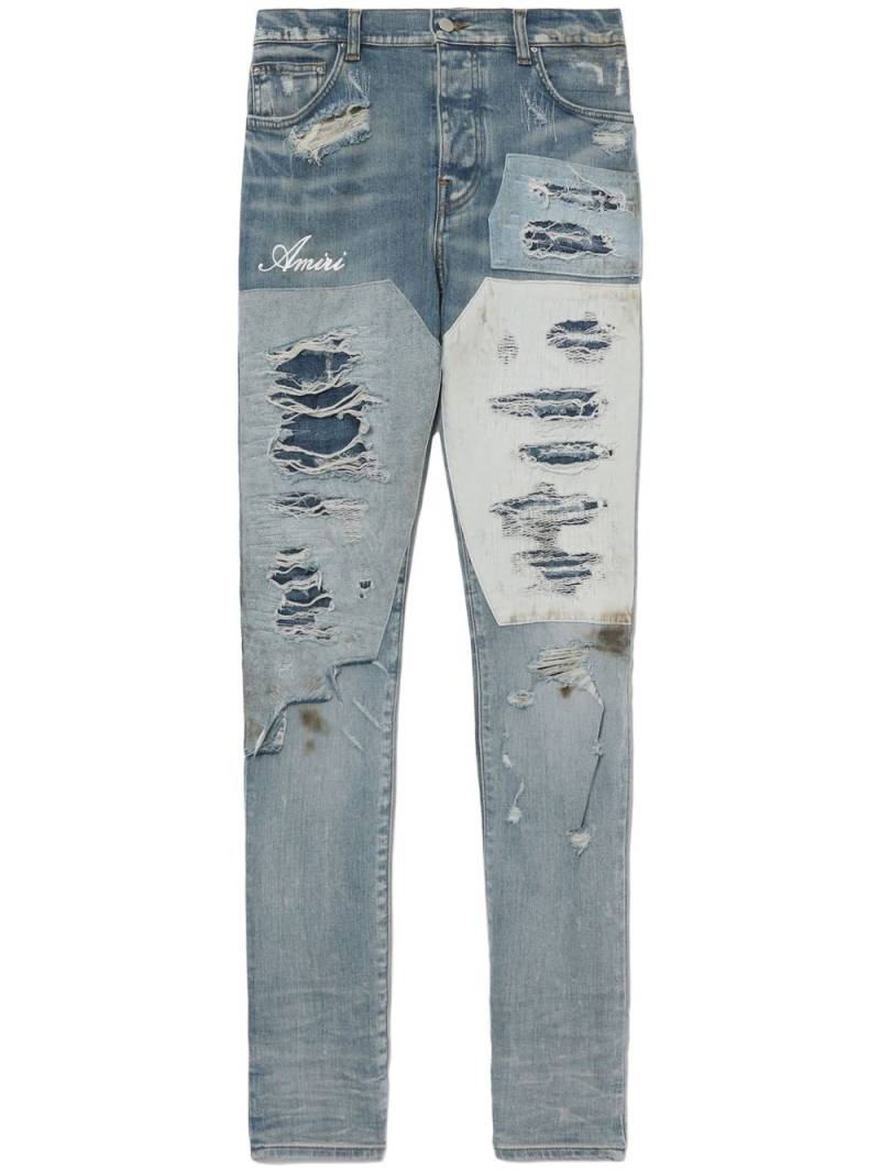 AMIRI logo-print distressed jeans - Blue von AMIRI