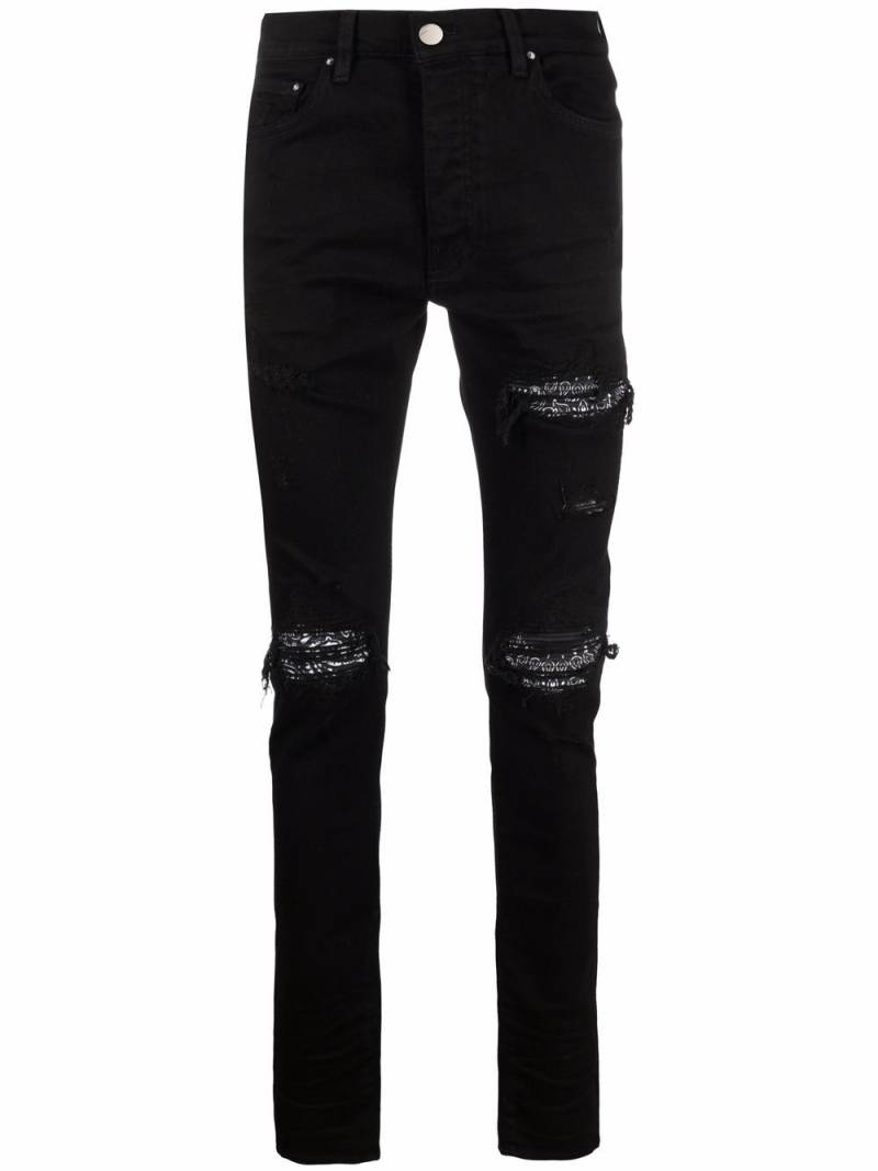 AMIRI ripped-detailing skinny jeans - Black von AMIRI