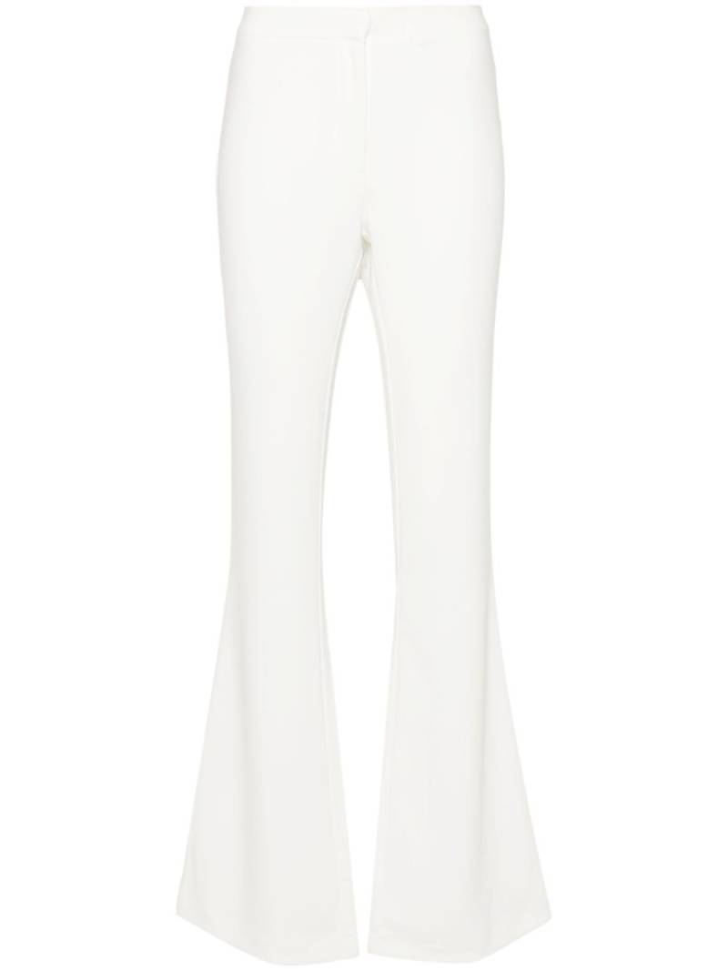 ANDREĀDAMO flared-design trousers - White von ANDREĀDAMO