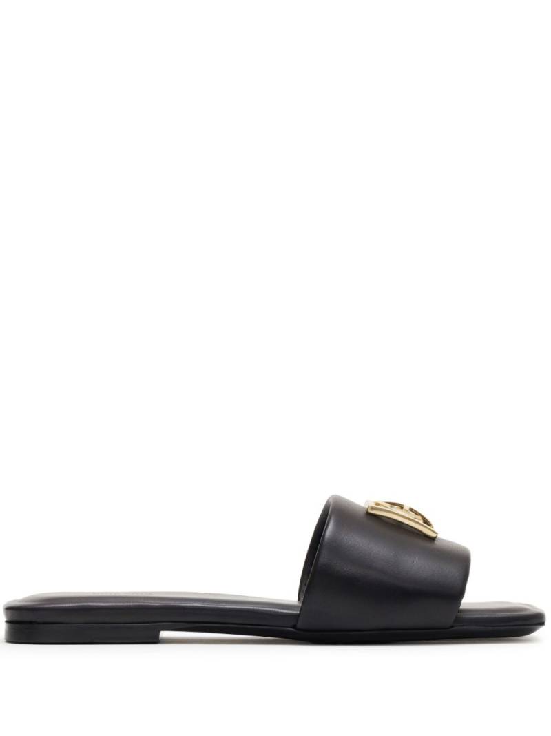 ANINE BING Ria monogramed leather slides - Black von ANINE BING