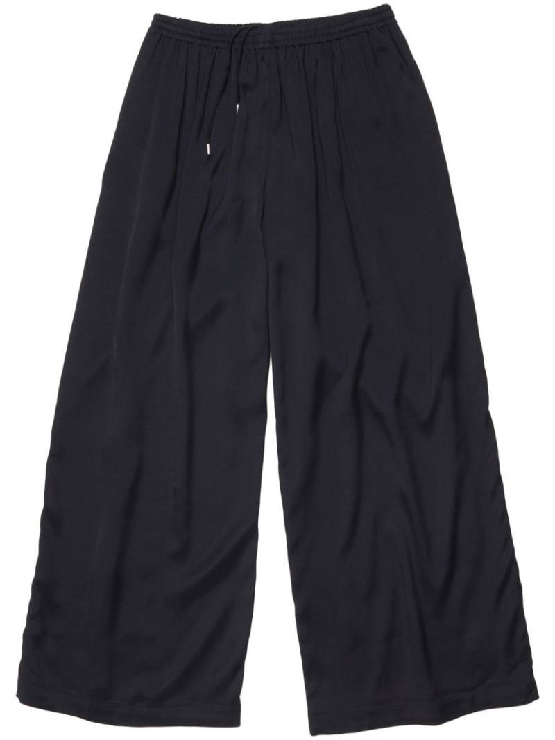 Acne Studios satin track pants - Blue von Acne Studios