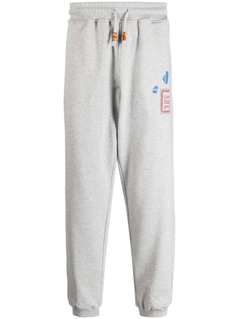 Adish Alkhws logo-print cotton track pants - Grey von Adish