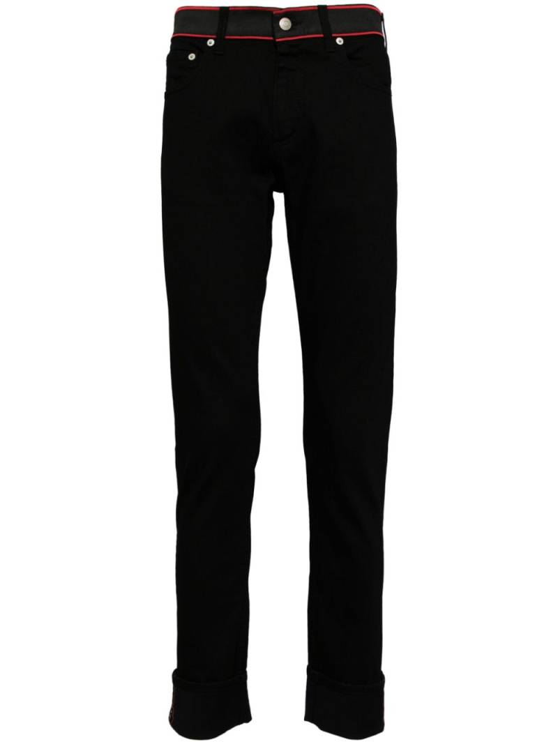 Alexander McQueen contrasting waistband slim-fit jeans - Black von Alexander McQueen