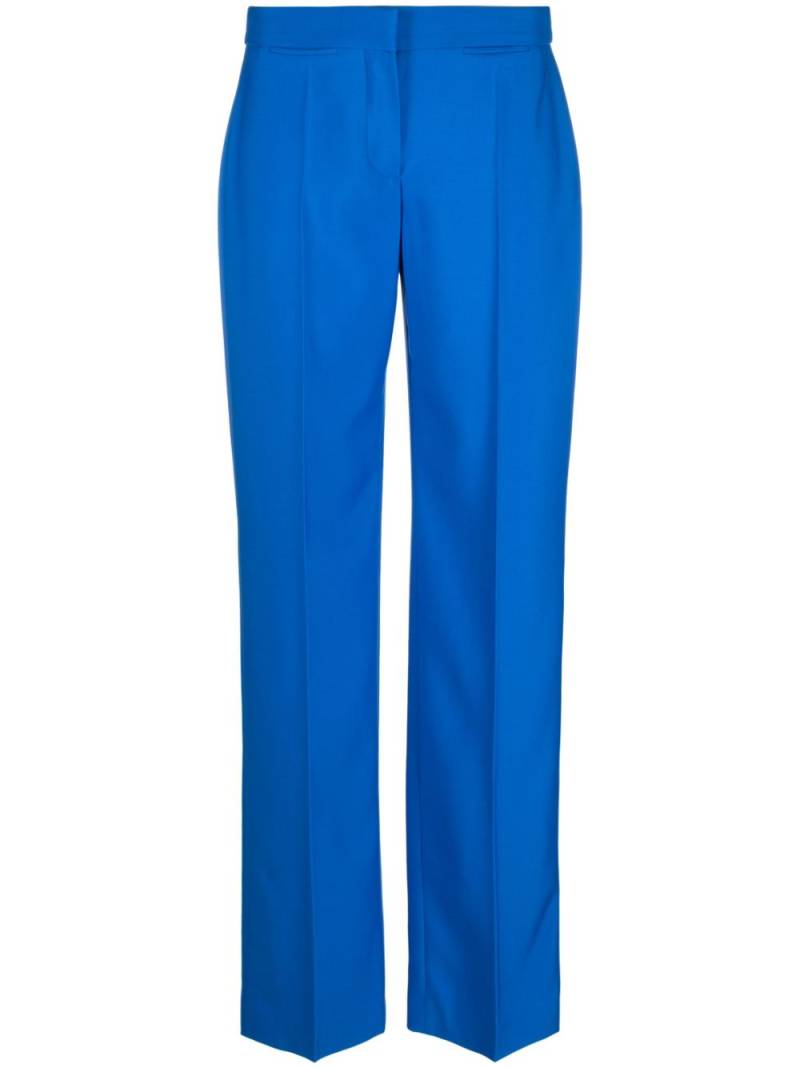 Alexander McQueen low-rise tailored trousers - Blue von Alexander McQueen