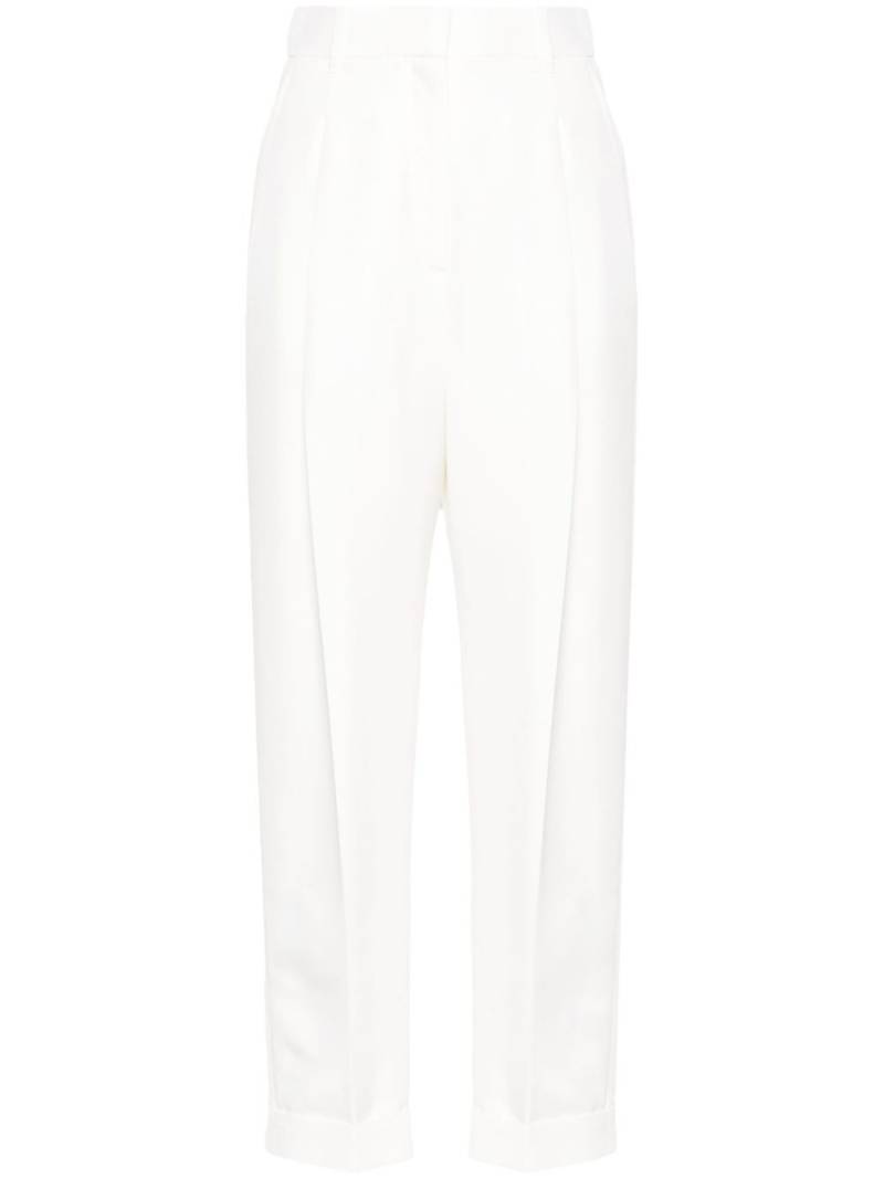 Alexander McQueen slim-fit peg trousers - White von Alexander McQueen