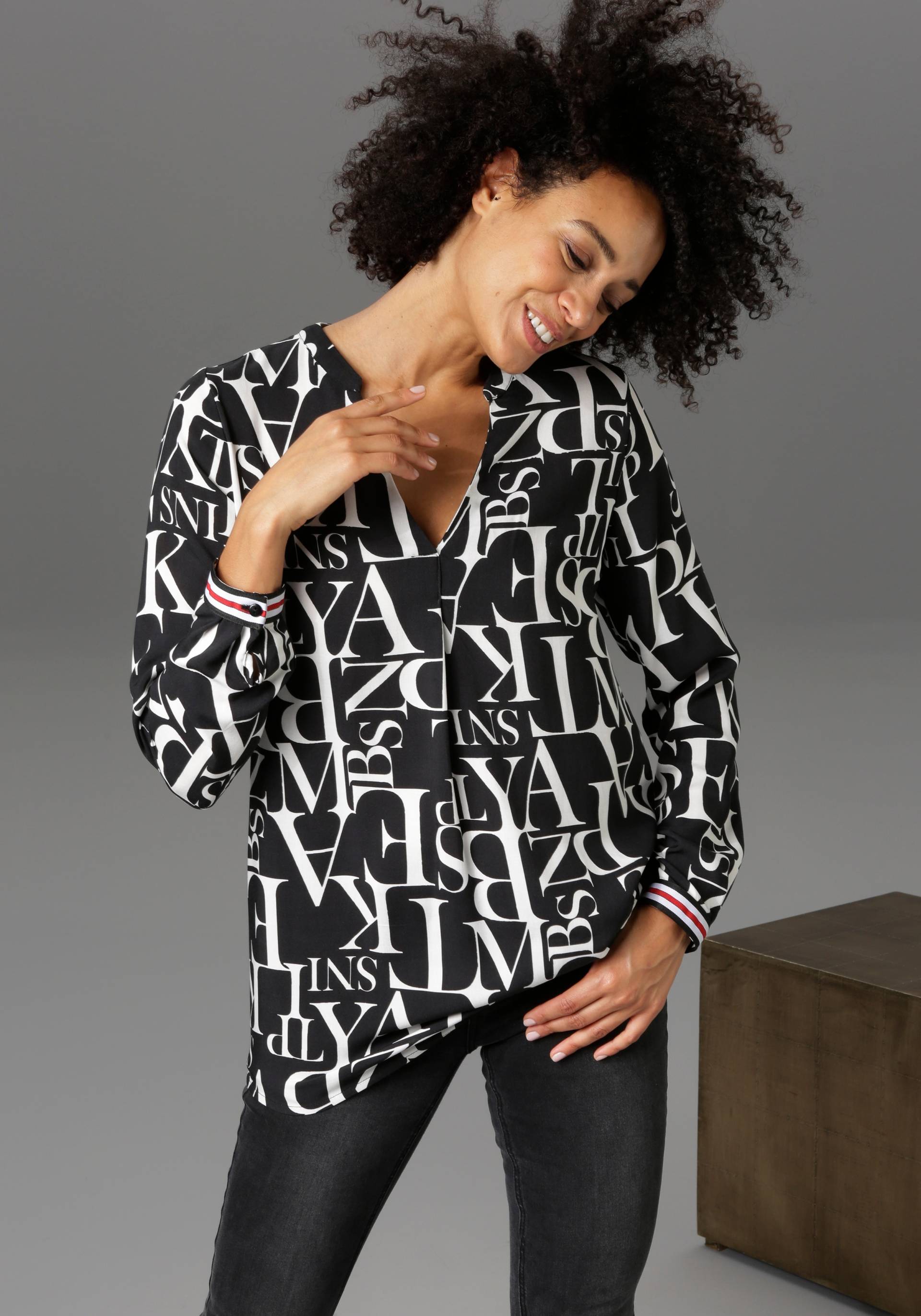 Aniston CASUAL Schlupfbluse, mit Buchstaben bedruckt Aniston CASUAL Schlupfbluse, mit Buchstaben bedruckt von Aniston CASUAL
