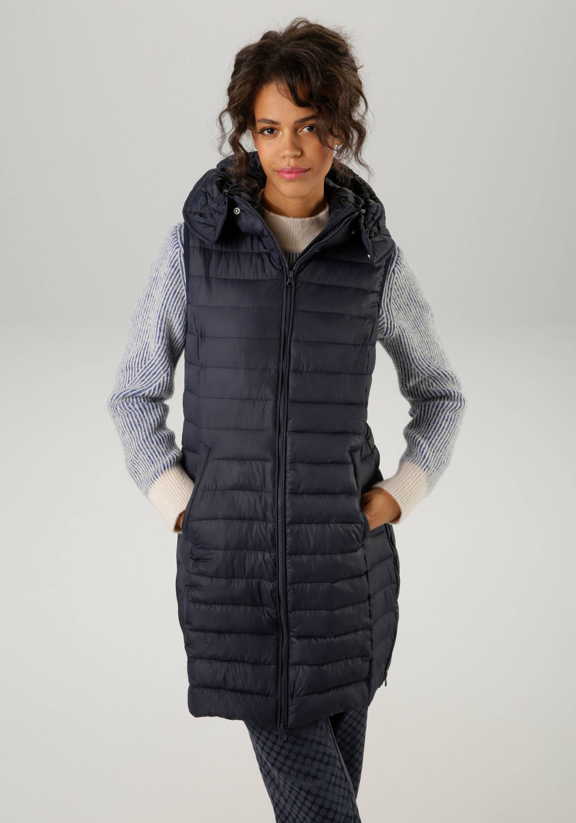 Aniston CASUAL Steppweste, mit verstellbarer Kapuze Aniston CASUAL Steppweste, mit verstellbarer Kapuze von Aniston CASUAL