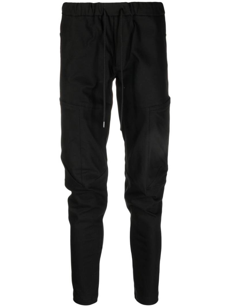 Attachment drawstring tapered-leg jeans - Black von Attachment