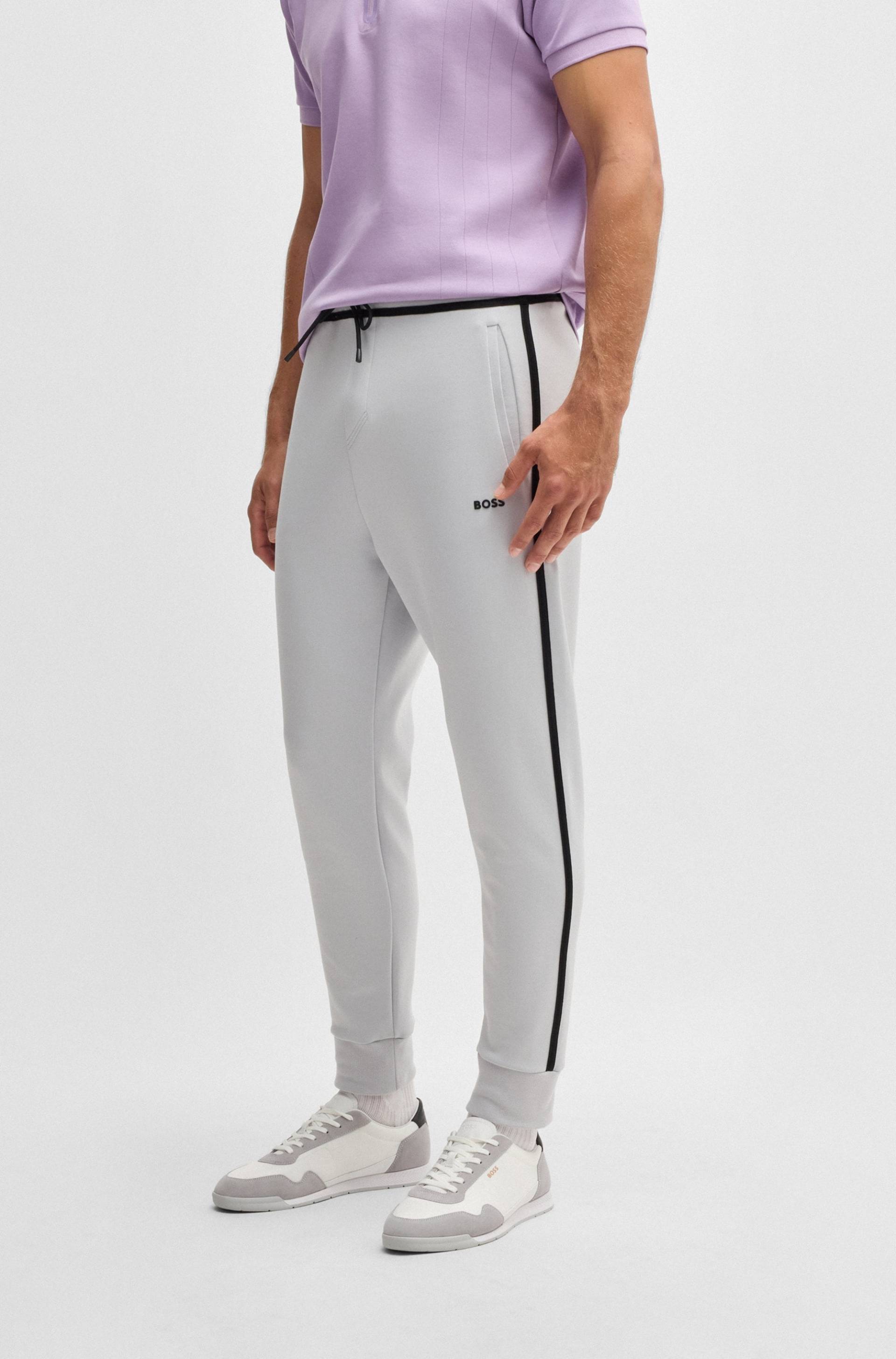 BOSS GREEN Jogginghose »Hadiko Tape«, mit elastischem Bund BOSS GREEN Jogginghose »Hadiko Tape«, mit elastischem Bund von BOSS GREEN