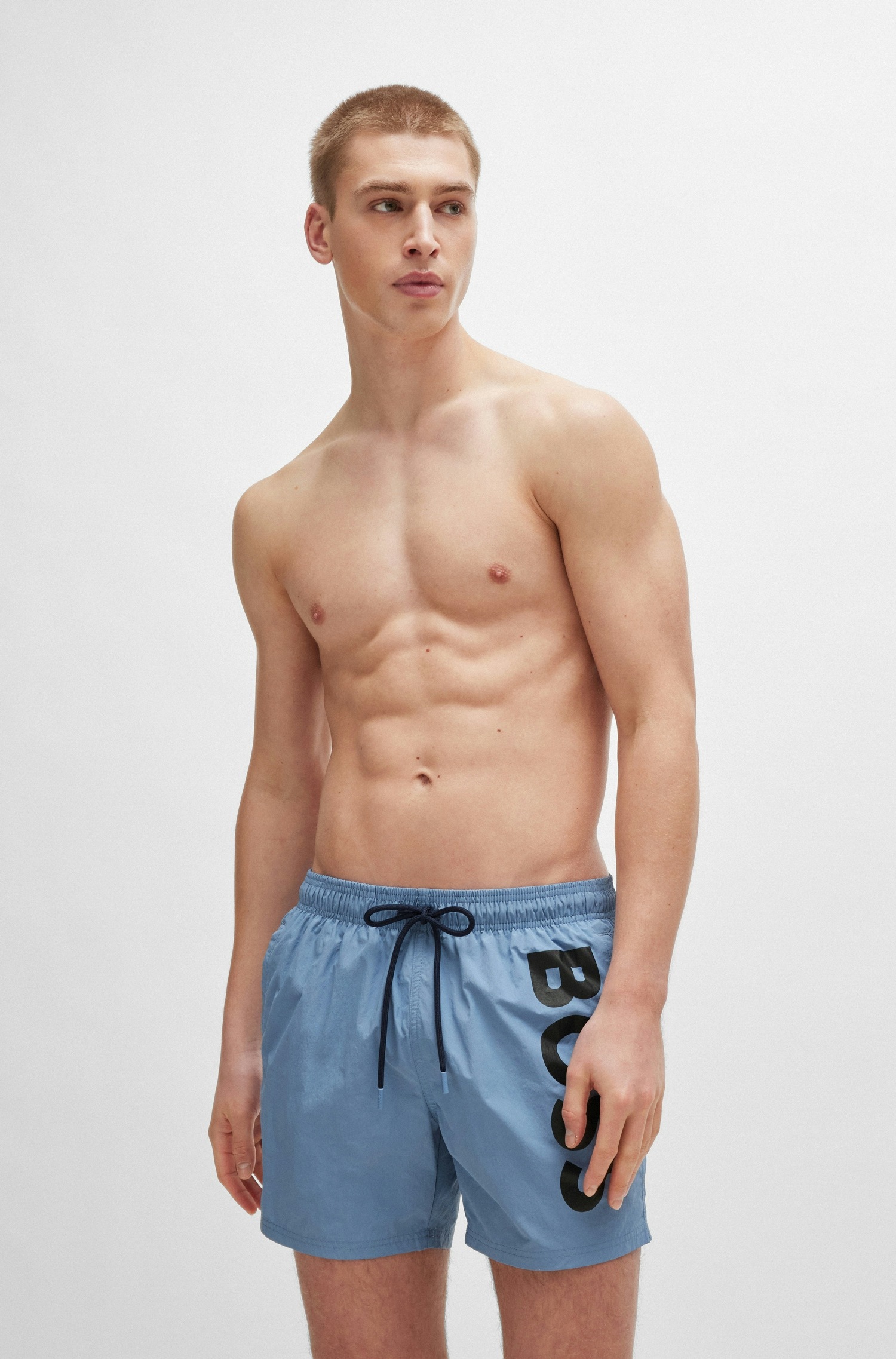 BOSS Badeshorts »Octopus«, mit kontrastfarbenem BOSS Logo-Schriftzug auf dem Bein BOSS Badeshorts »Octopus«, mit kontrastfarbenem BOSS Logo-Schriftzug auf dem Bein von BOSS
