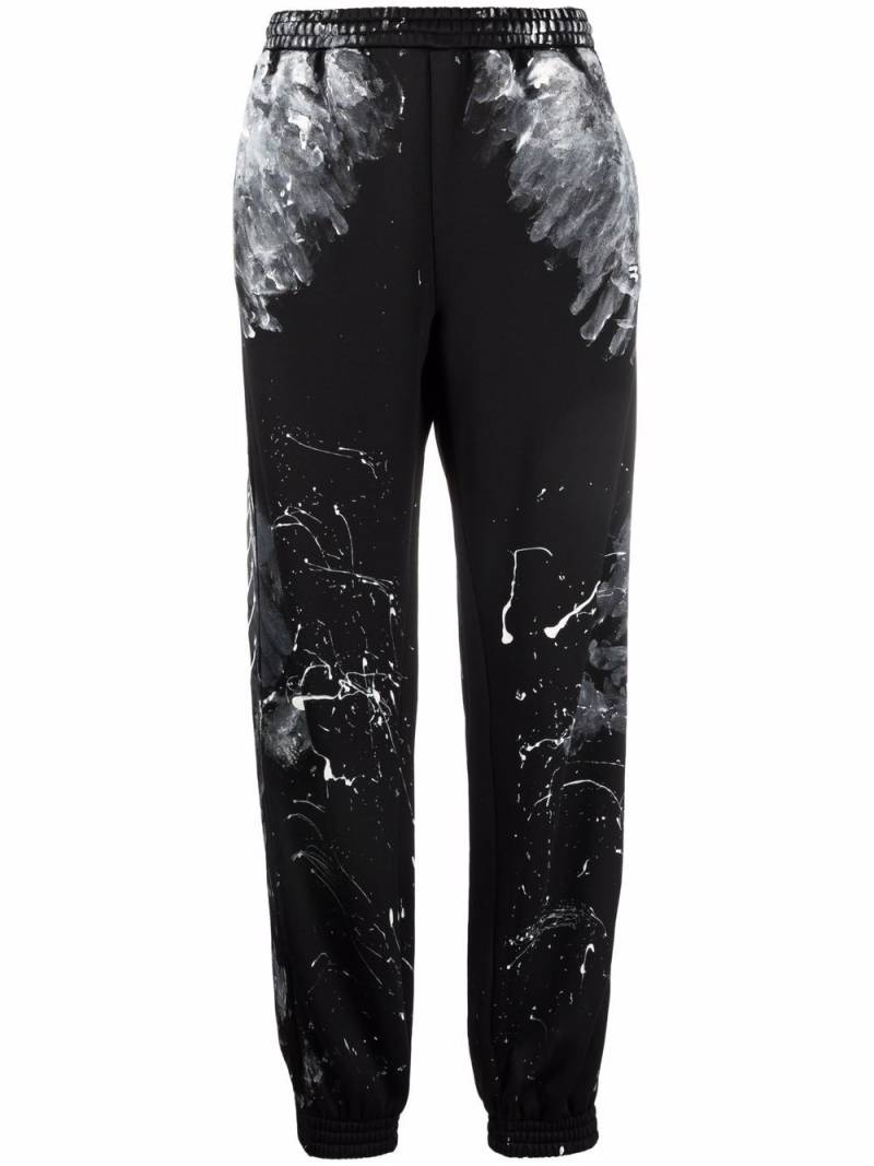 Balenciaga paint splatter track pants - Black von Balenciaga