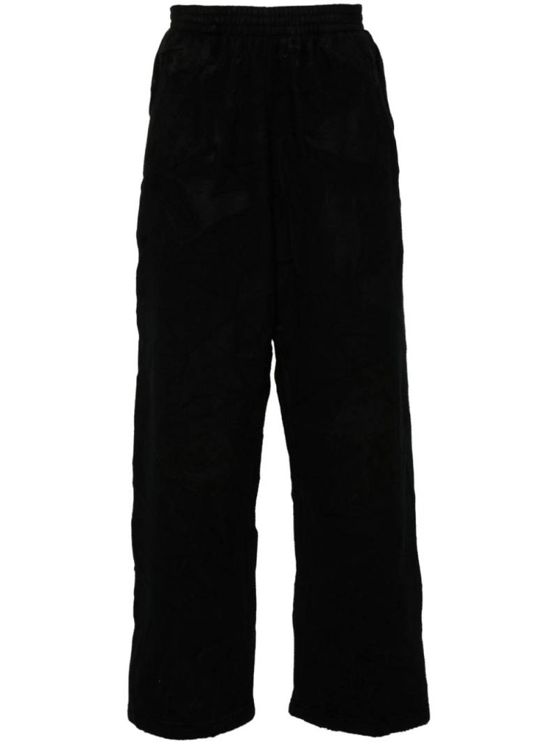 Balenciaga crinkled-effect track pants - Black von Balenciaga