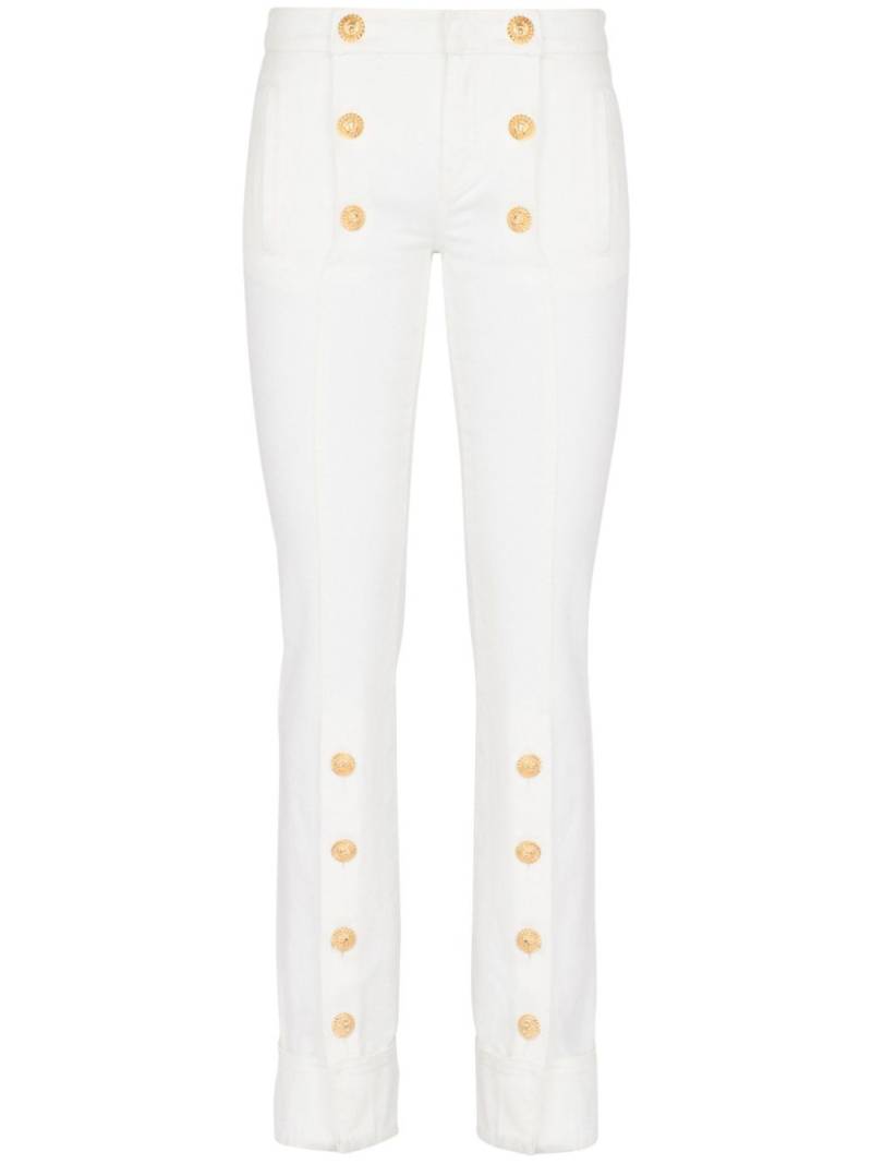 Balmain button-detail slim-cut jeans - White von Balmain