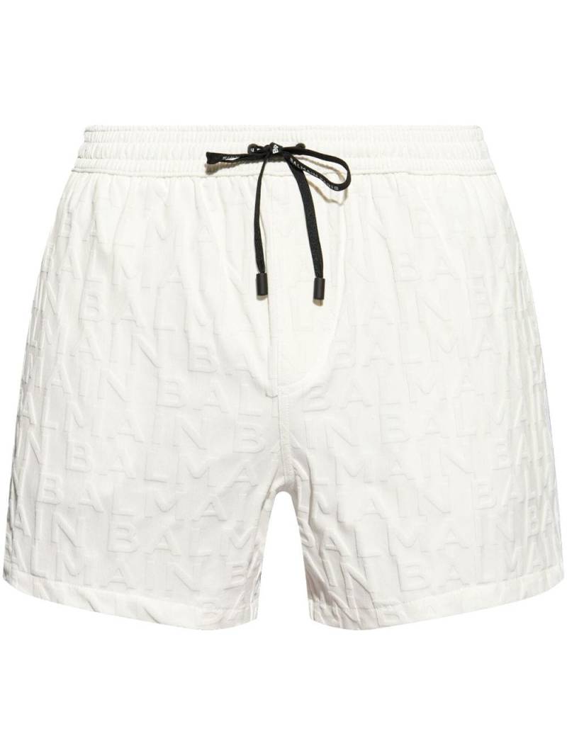 Balmain logo-embossed swim shorts - White von Balmain