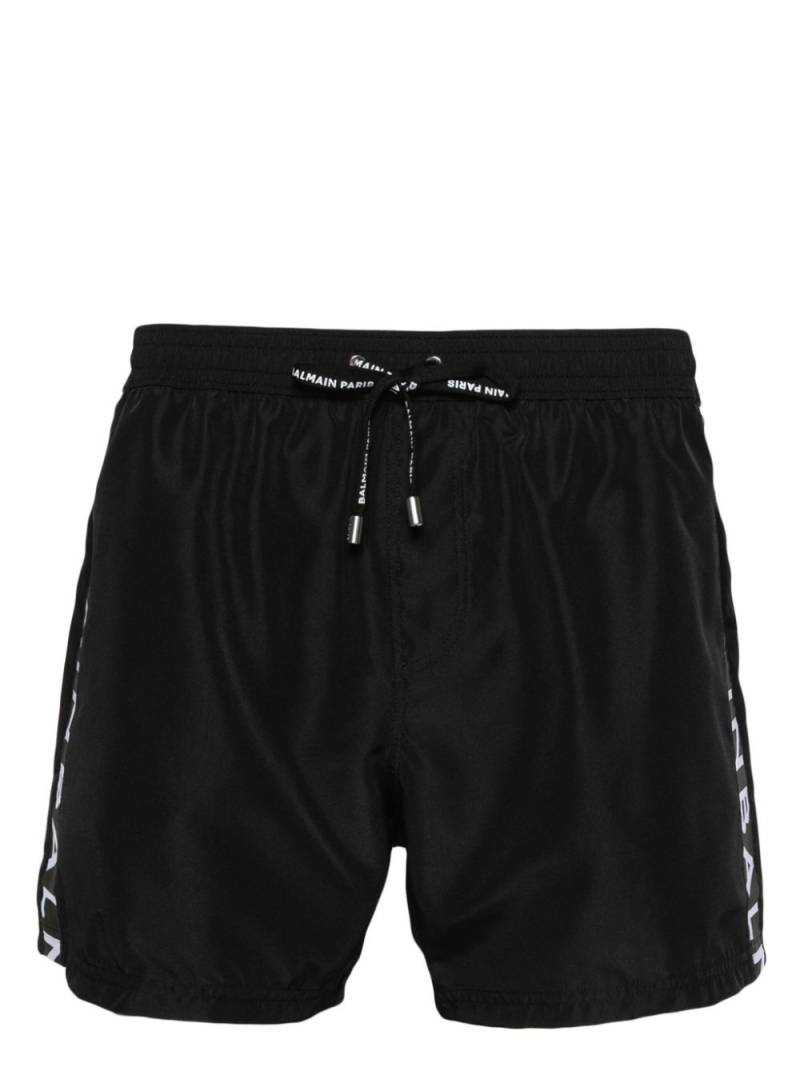 Balmain logo-stripe swim shorts - Black von Balmain