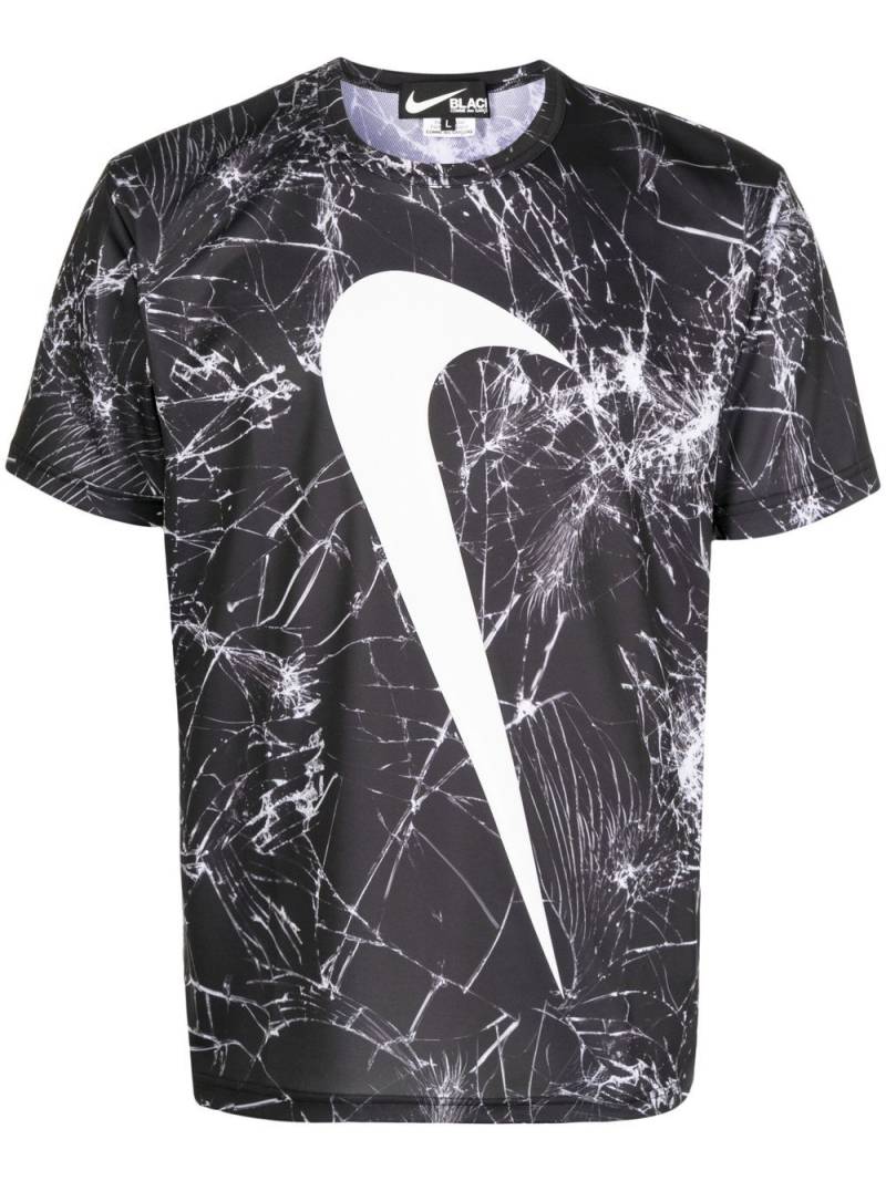 Black Comme Des Garçons Swoosh-print cracked T-shirt von Black Comme Des Garçons