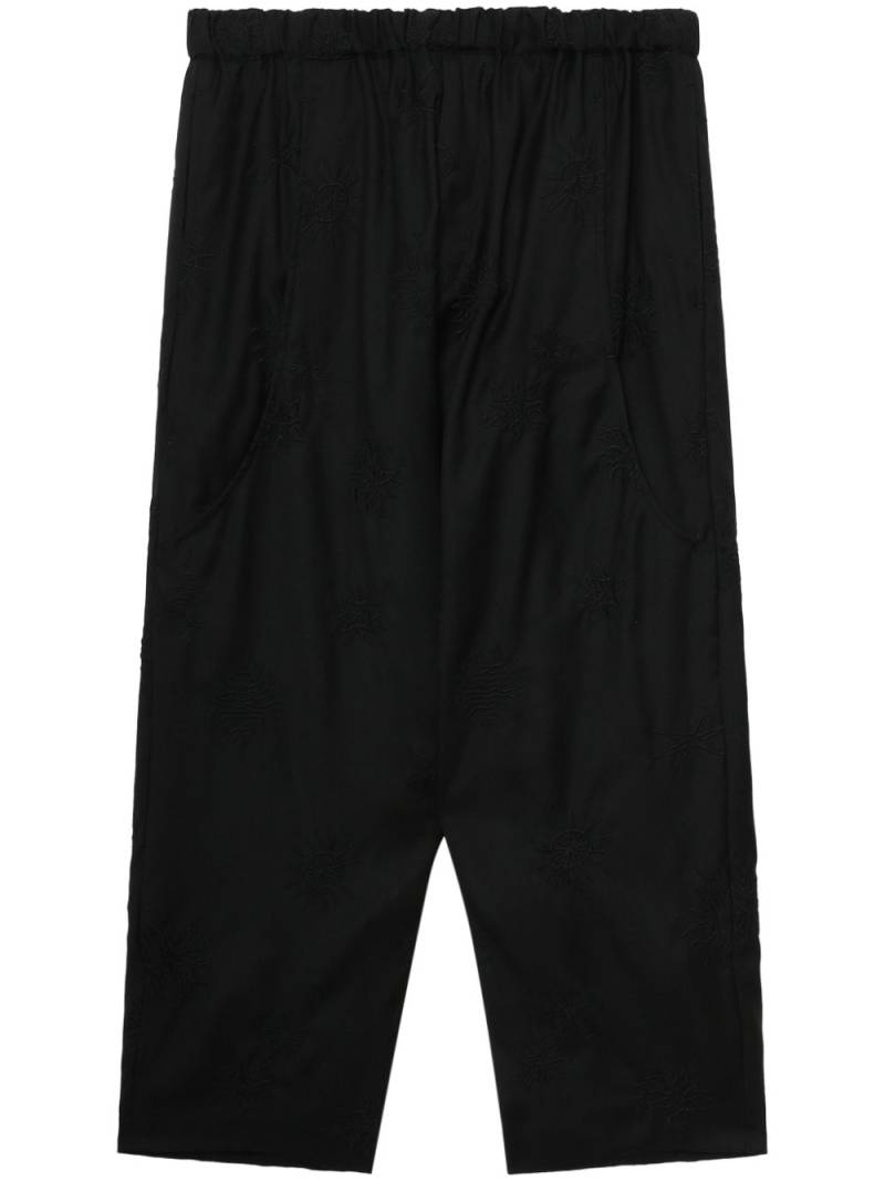 Black Comme Des Garçons drop-crotch cropped trousers von Black Comme Des Garçons