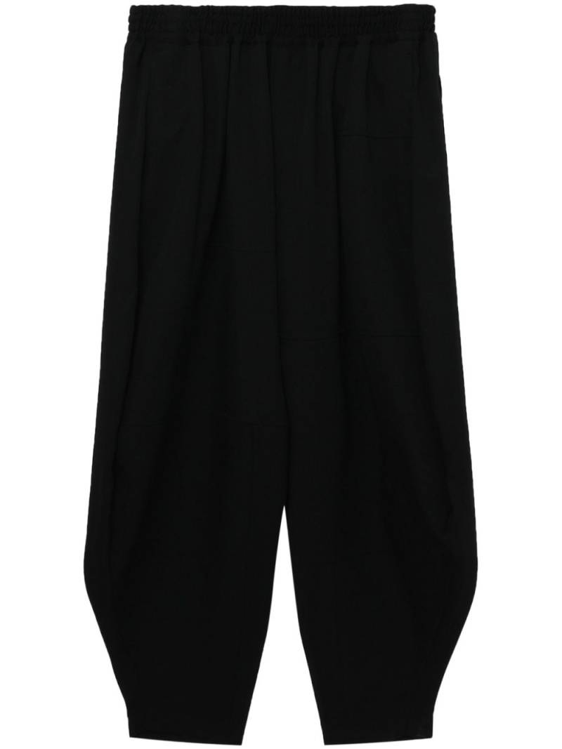 Black Comme Des Garçons drop-crotch wool trousers von Black Comme Des Garçons