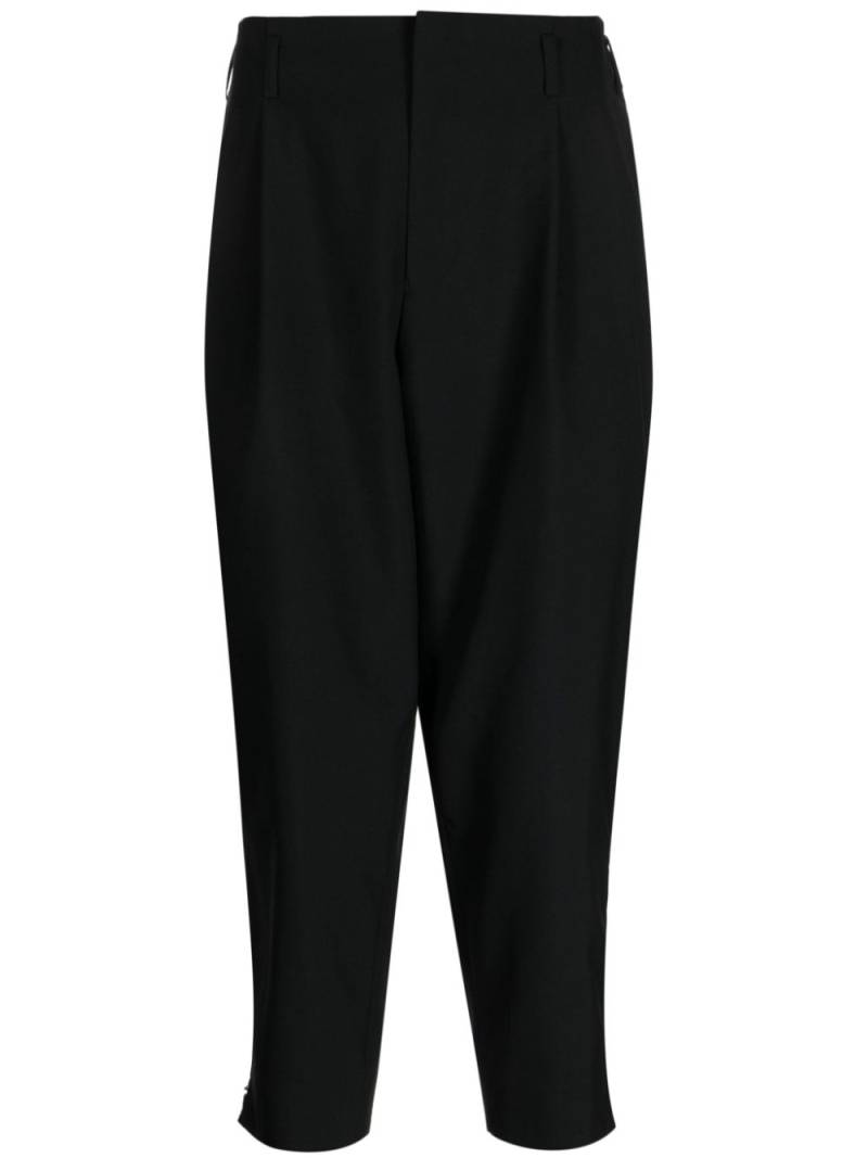 Black Comme Des Garçons tapered-leg cropped wool trousers von Black Comme Des Garçons