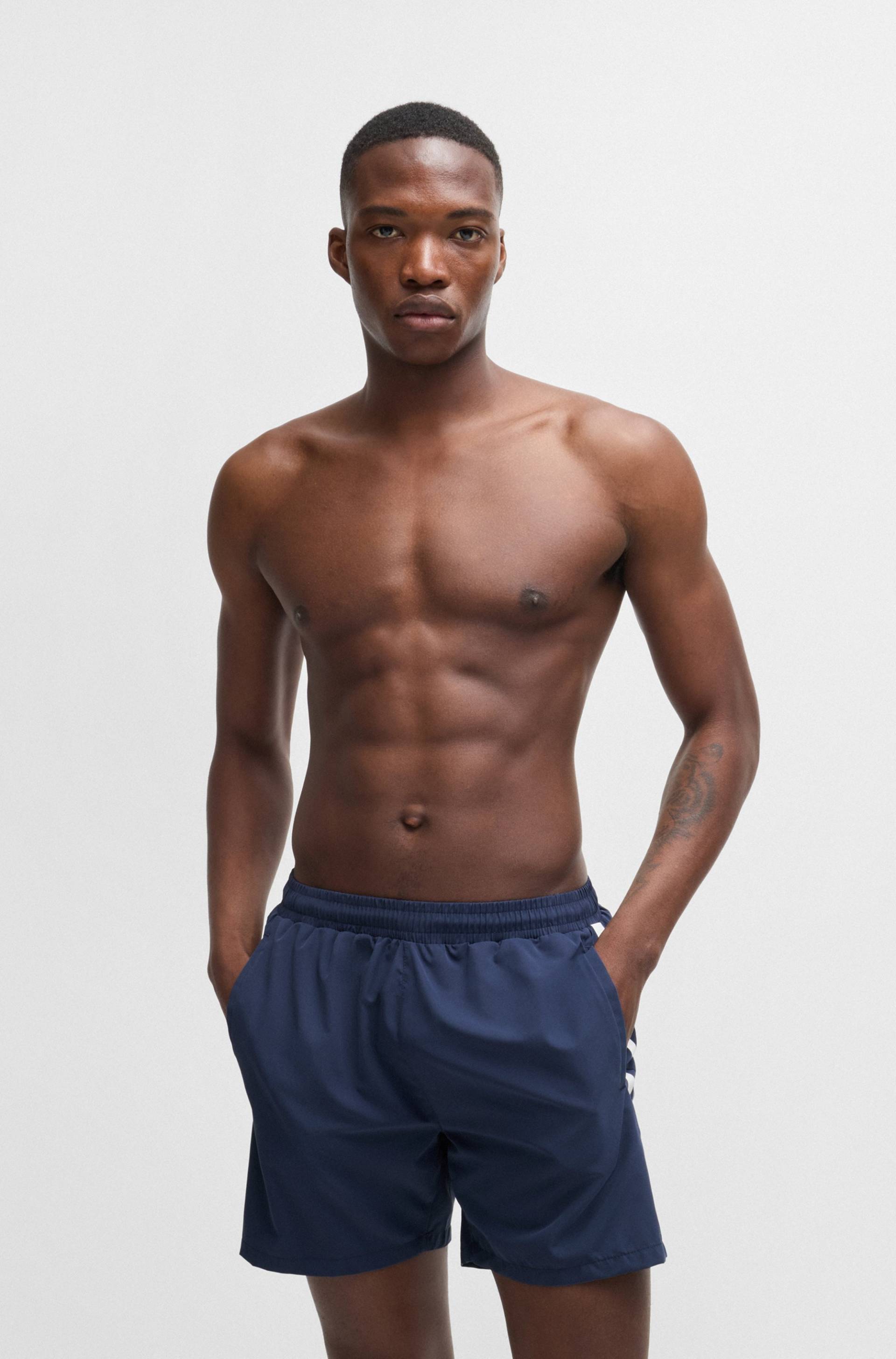 BOSS Badeshorts »Dolphin«, mit seitlichem Kontraststreifen BOSS Badeshorts »Dolphin«, mit seitlichem Kontraststreifen von Boss