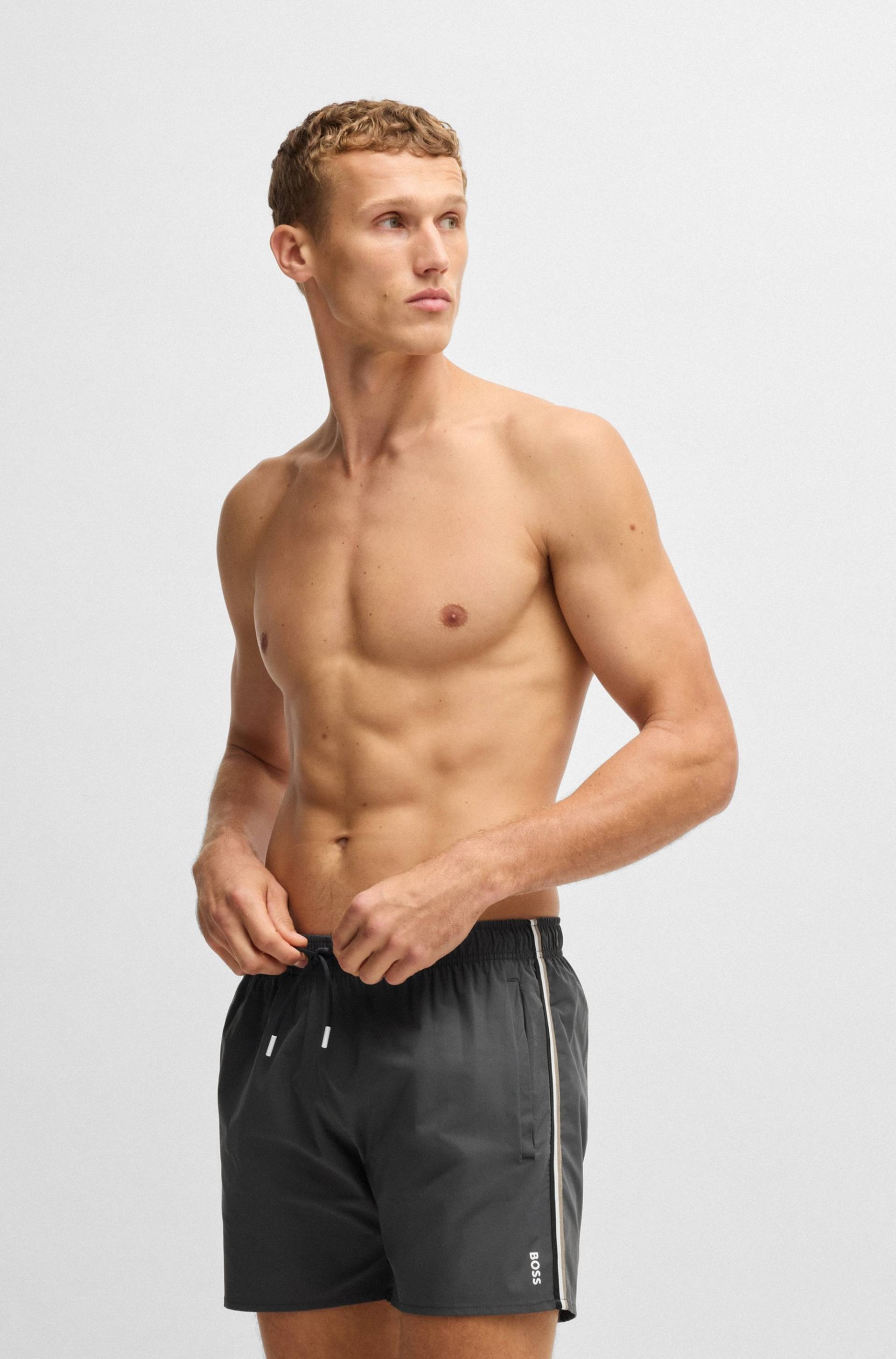 BOSS Badeshorts »Iconic«, mit seitlichen Kontraststreifen BOSS Badeshorts »Iconic«, mit seitlichen Kontraststreifen von Boss