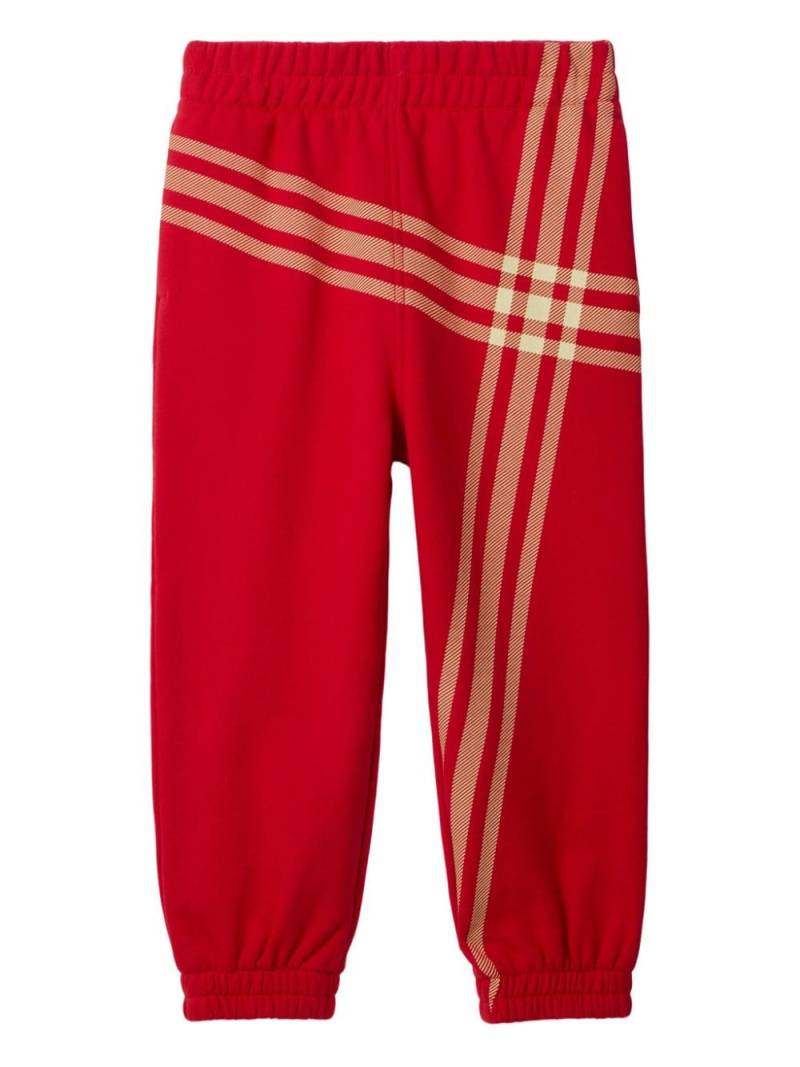 Burberry Kids check-print cotton track pants - Red von Burberry Kids