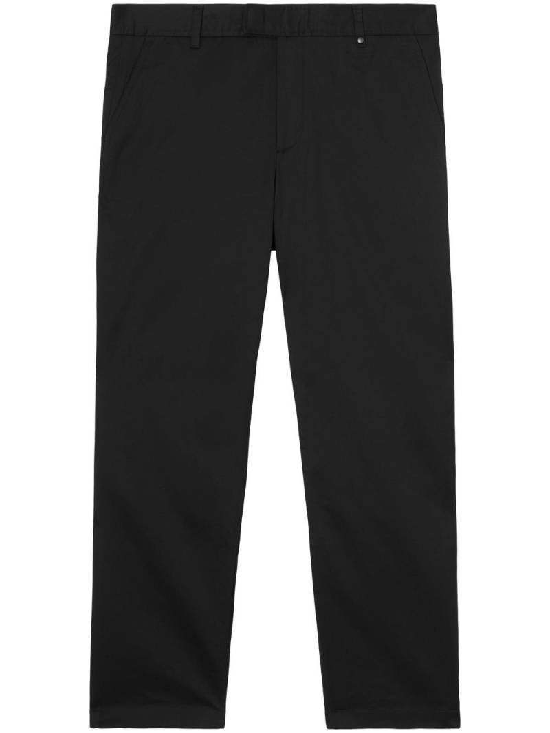 Burberry slim-cut monogram-motif chinos - Black von Burberry