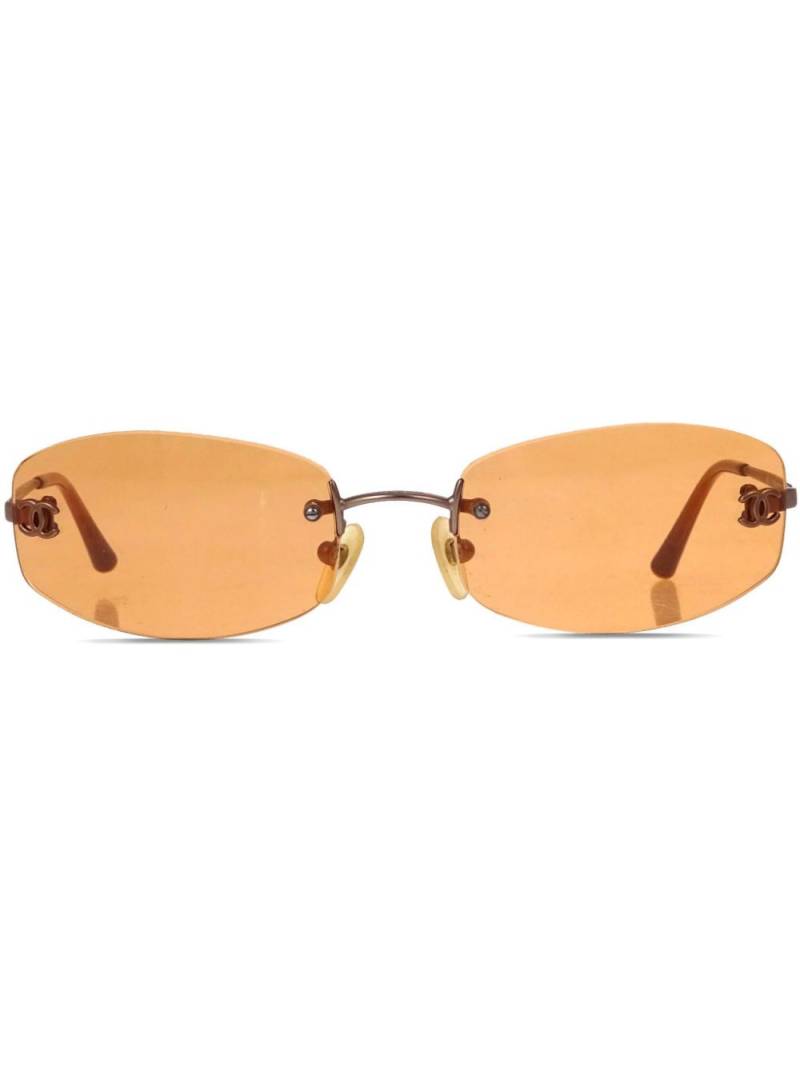 CHANEL Pre-Owned 1990-2000 oval-frame sunglasses - Orange von CHANEL Pre-Owned