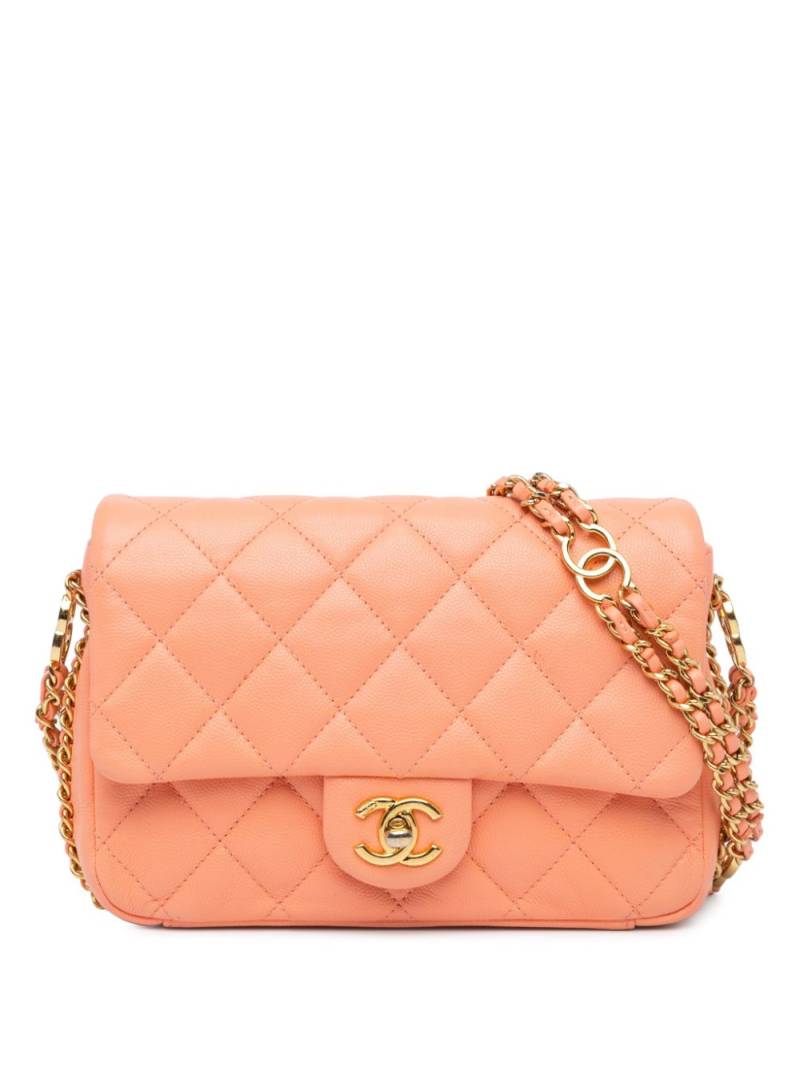 CHANEL Pre-Owned 2021-2023 Mini Quilted Caviar CC You Flap crossbody bag - Orange von CHANEL Pre-Owned