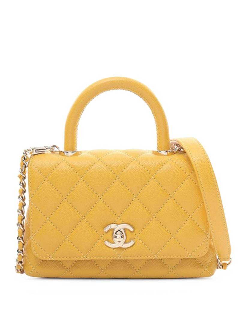 CHANEL Pre-Owned 2021-2024 Extra Mini Caviar Coco Top Handle satchel - Yellow von CHANEL Pre-Owned