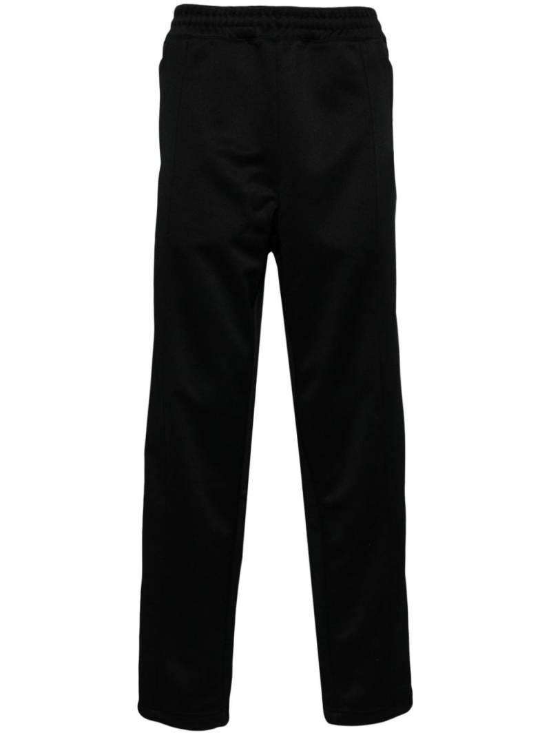 CHOCOOLATE logo-appliqué track pants - Black von CHOCOOLATE