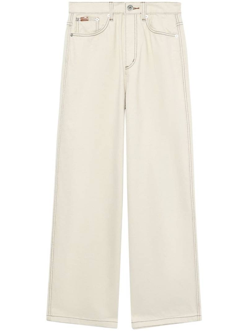 CHOCOOLATE logo-appliqué wide-leg jeans - Neutrals von CHOCOOLATE