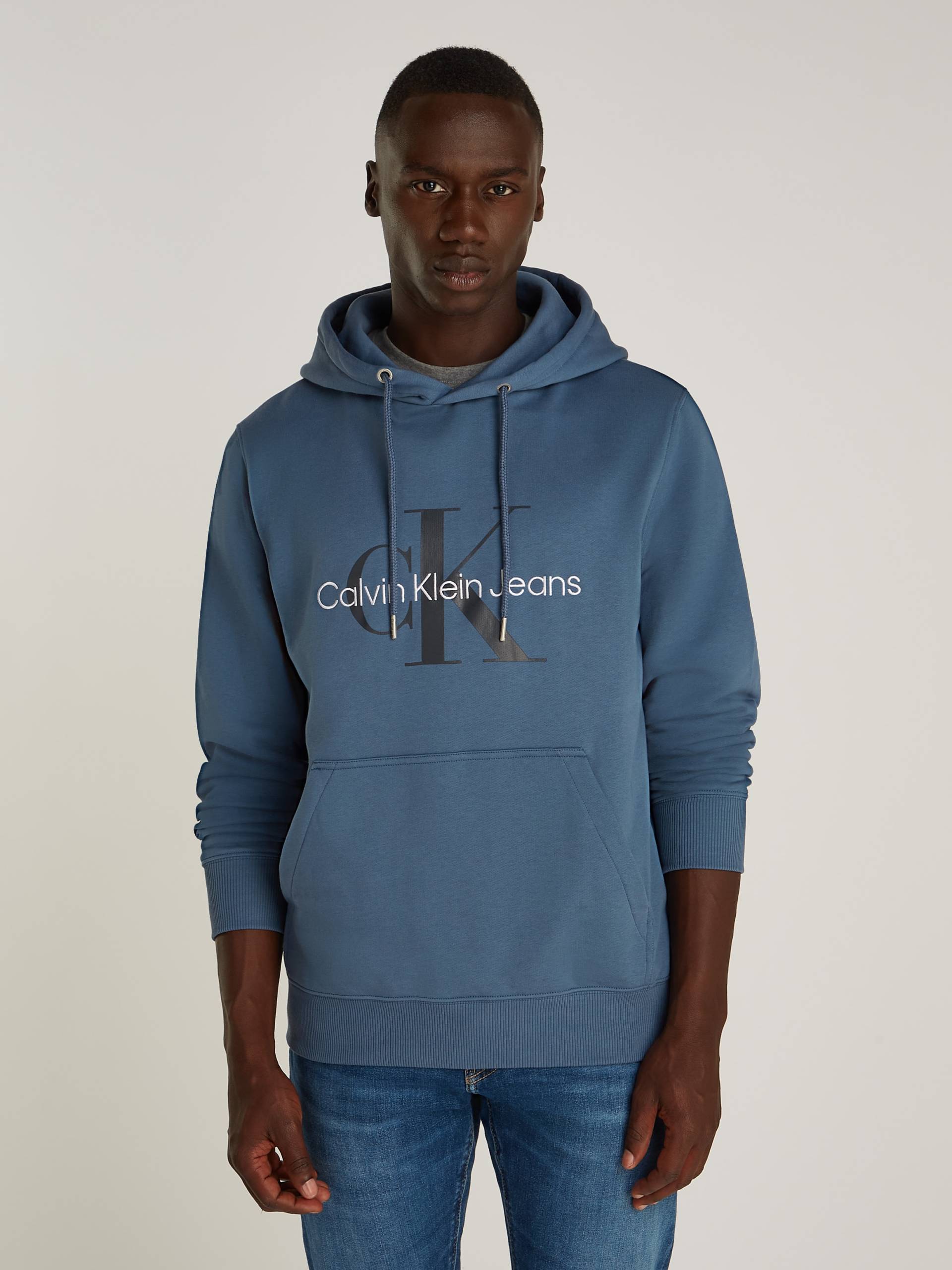 Calvin Klein Jeans Kapuzensweatshirt »SEASONAL MONOLOGO REGULAR HOODIE«, mit Logodruck und Stickerei von Calvin Klein Jeans