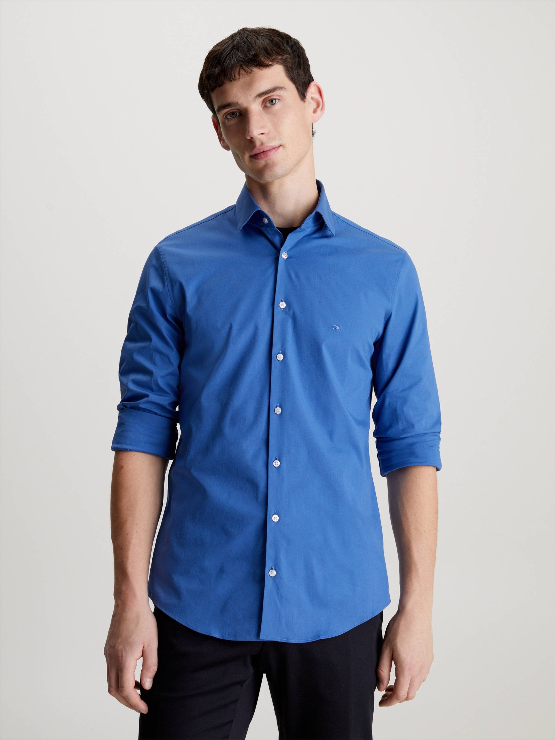 Calvin Klein Businesshemd »POPLIN STRETCH SLIM SHIRT«, mit Kentkragen, Logoprint auf Brusthöhe Calvin Klein Businesshemd »POPLIN STRETCH SLIM SHIRT«, mit Kentkragen, Logoprint auf Brusthöhe von Calvin Klein