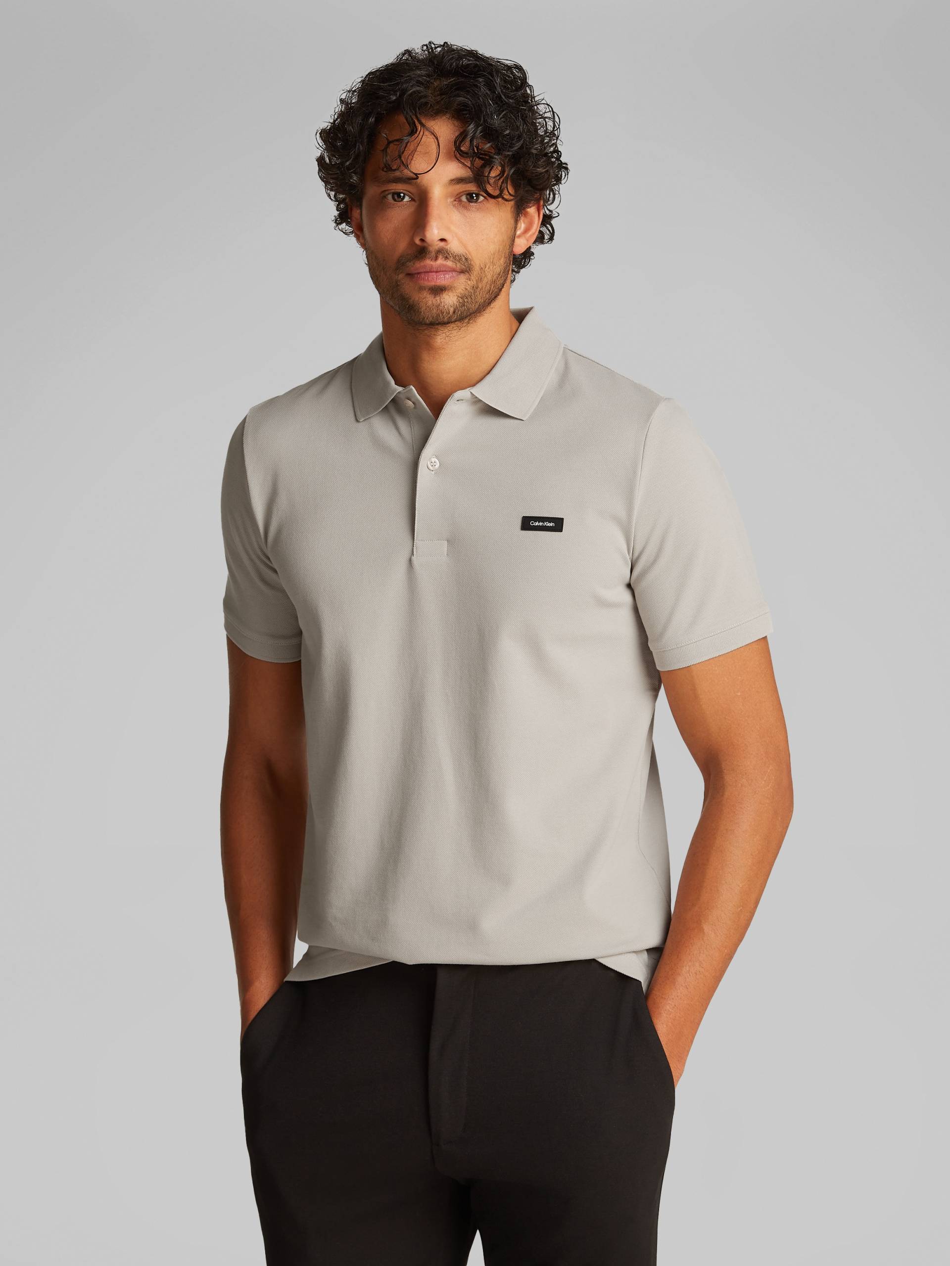 Calvin Klein Poloshirt, mit Calvin Klein Logo auf der Brust von Calvin Klein