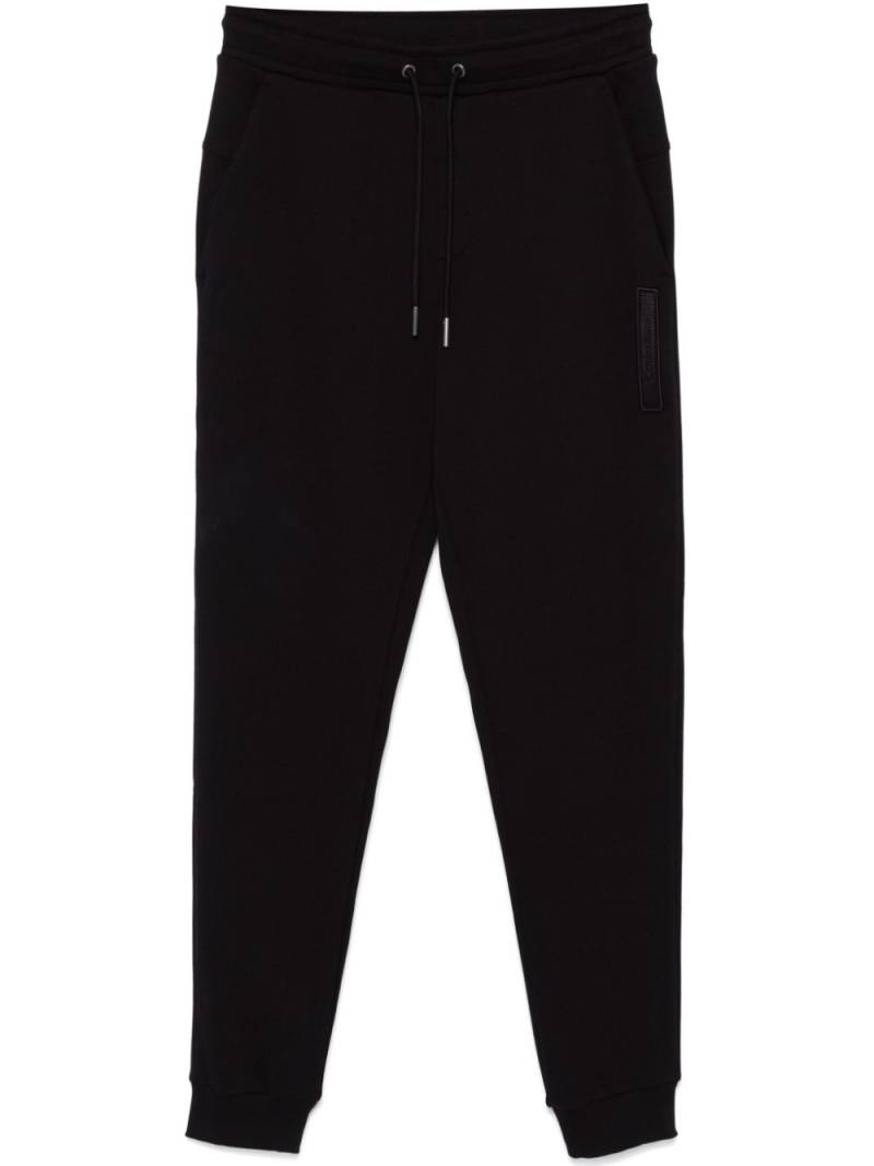 Calvin Klein logo-patch track pants - Black von Calvin Klein