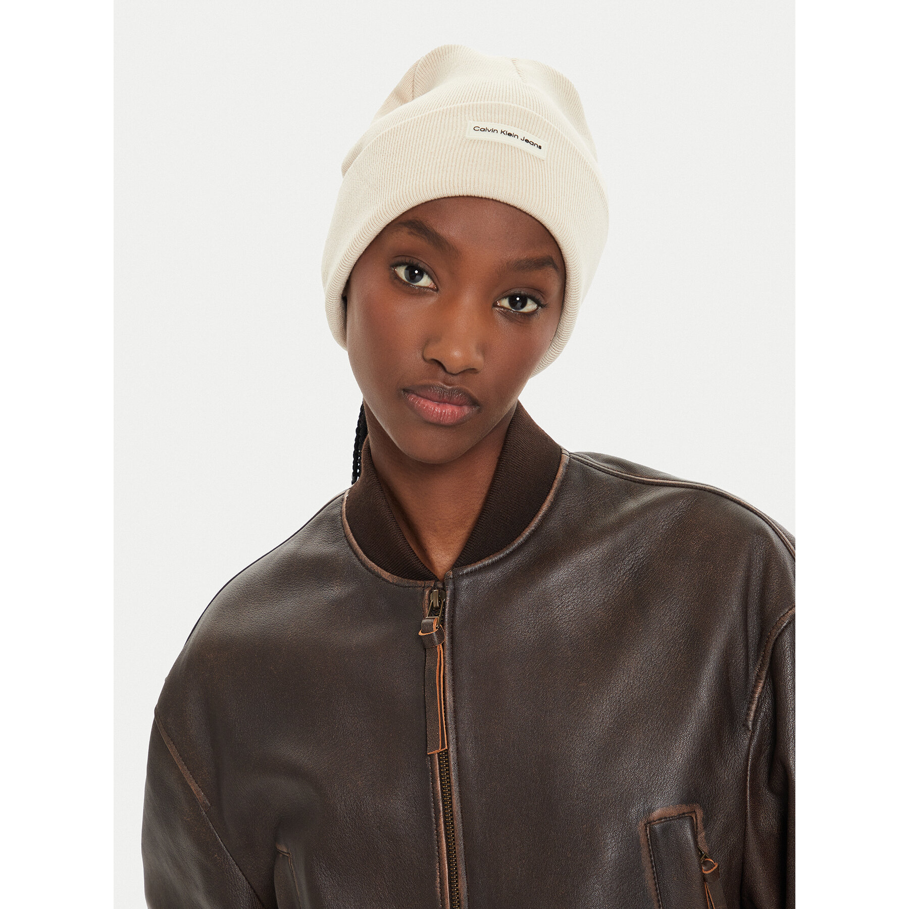 Mütze Calvin Klein Inst Patch Beanie K60K612322 Beige von Calvin Klein