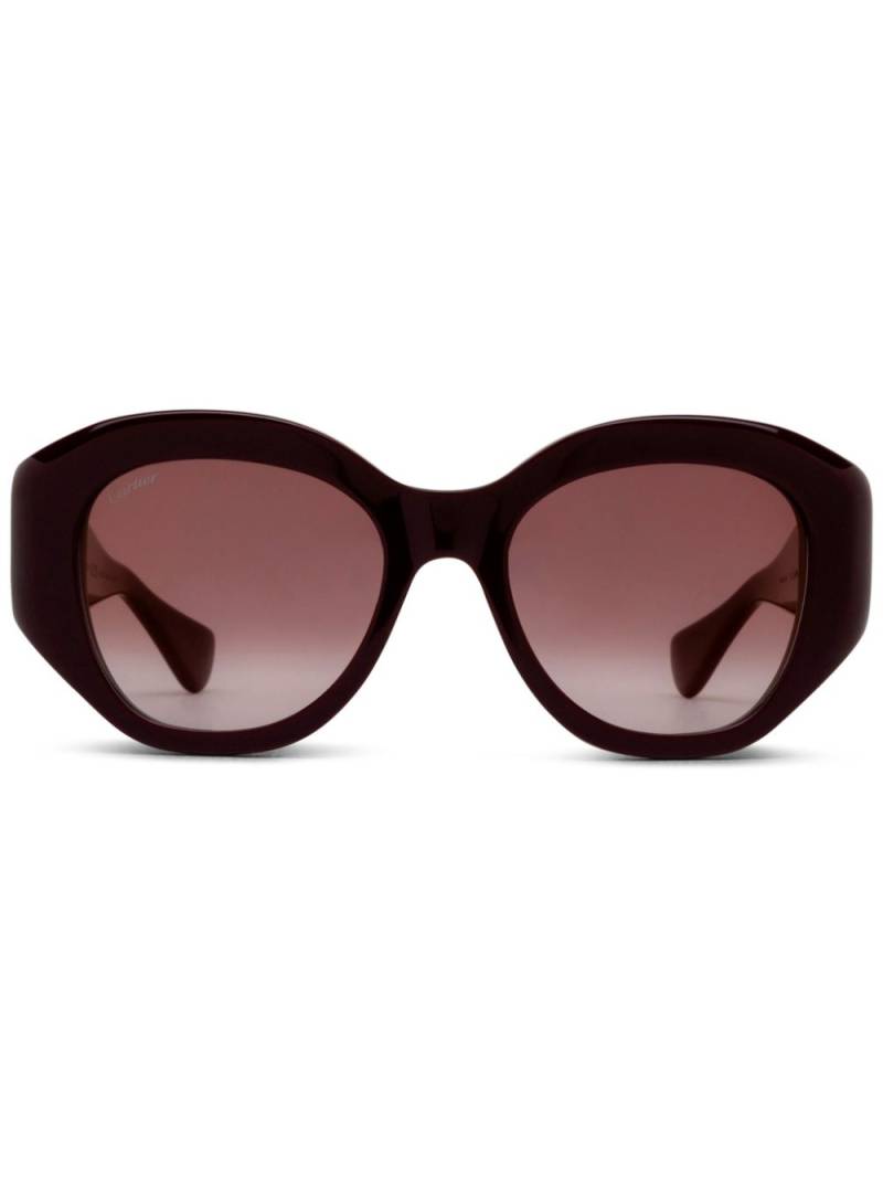 Cartier Eyewear oval frame sunglasses - Red von Cartier Eyewear