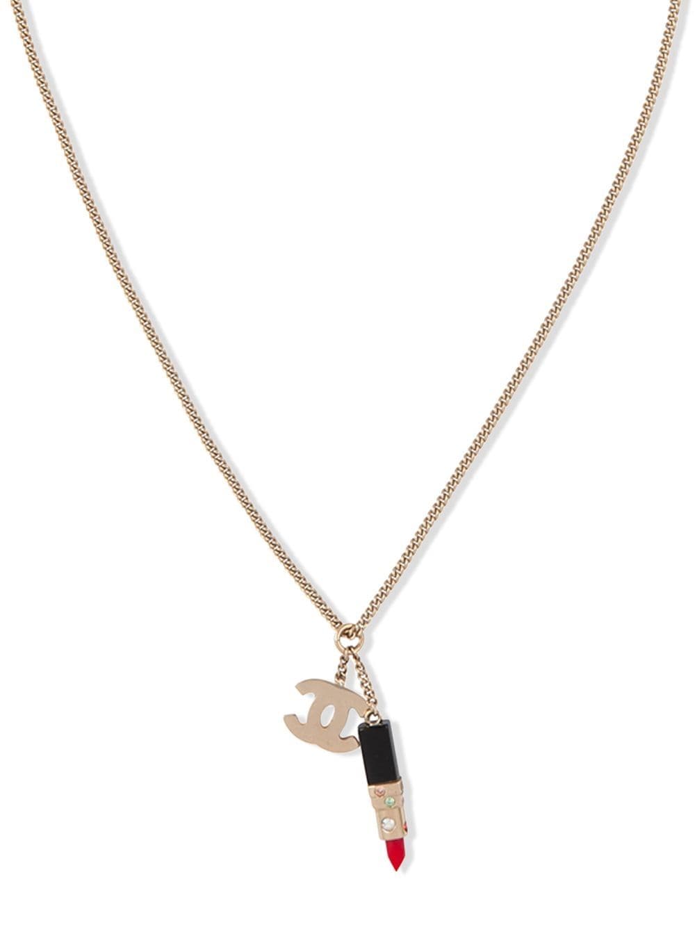 CHANEL Pre-Owned 2004 lipstick logo necklace - Gold von CHANEL Pre-Owned