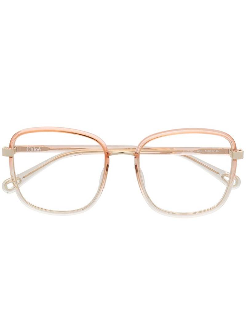 Chloé Eyewear oversize transparent-effect glasses - Orange von Chloé Eyewear