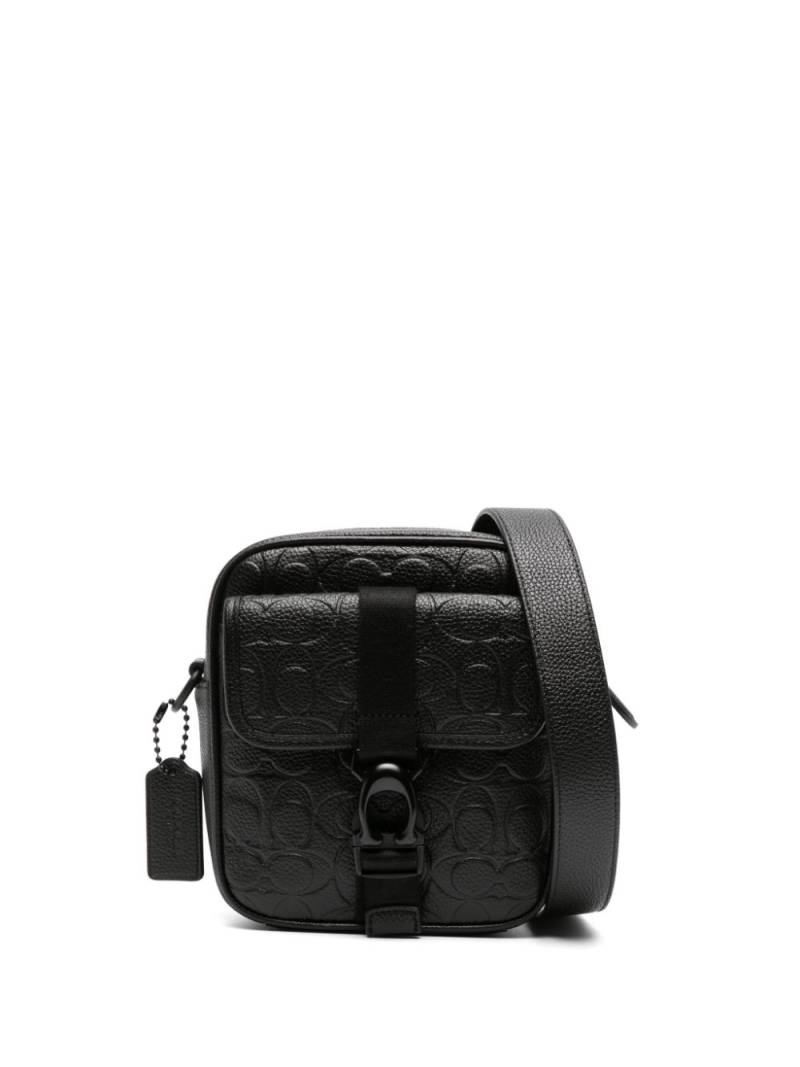 Coach monogram-debossed leather messenger bag - Black von Coach