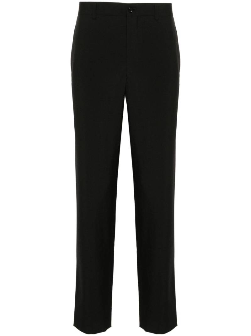 Comme des Garçons Homme Plus mid-rise tapered trousers - Black von Comme des Garçons Homme Plus