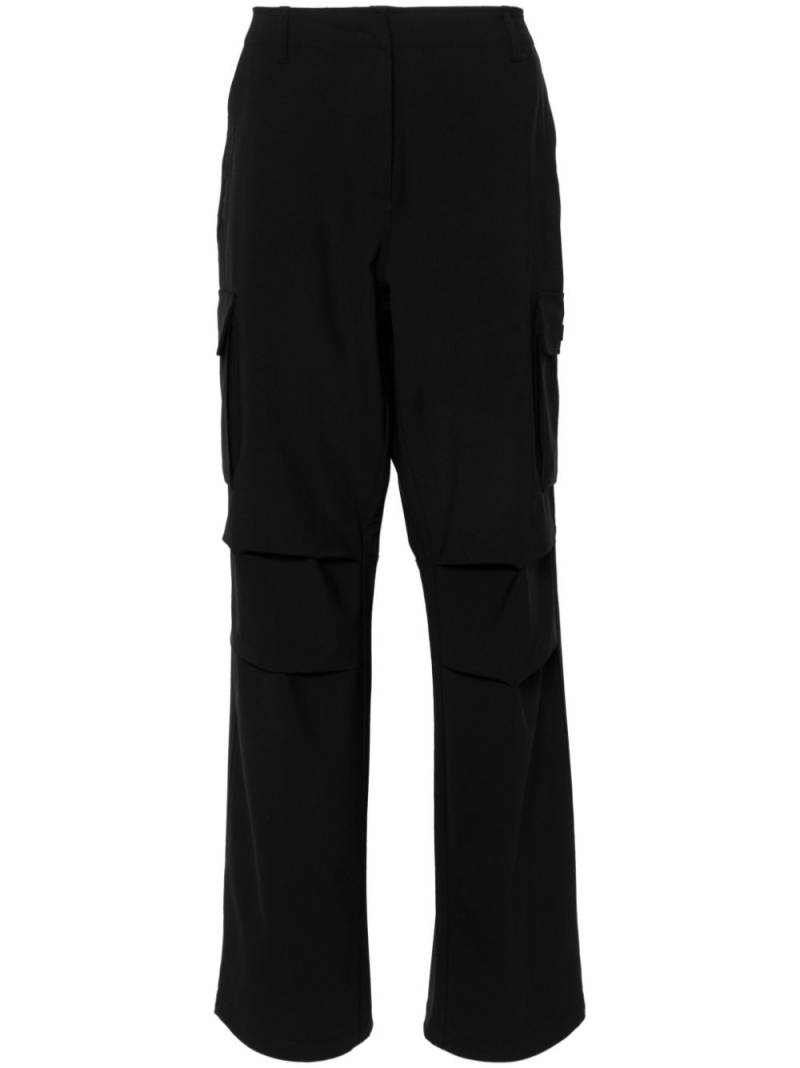 Coperni logo-patch wide-leg trousers - Black von Coperni